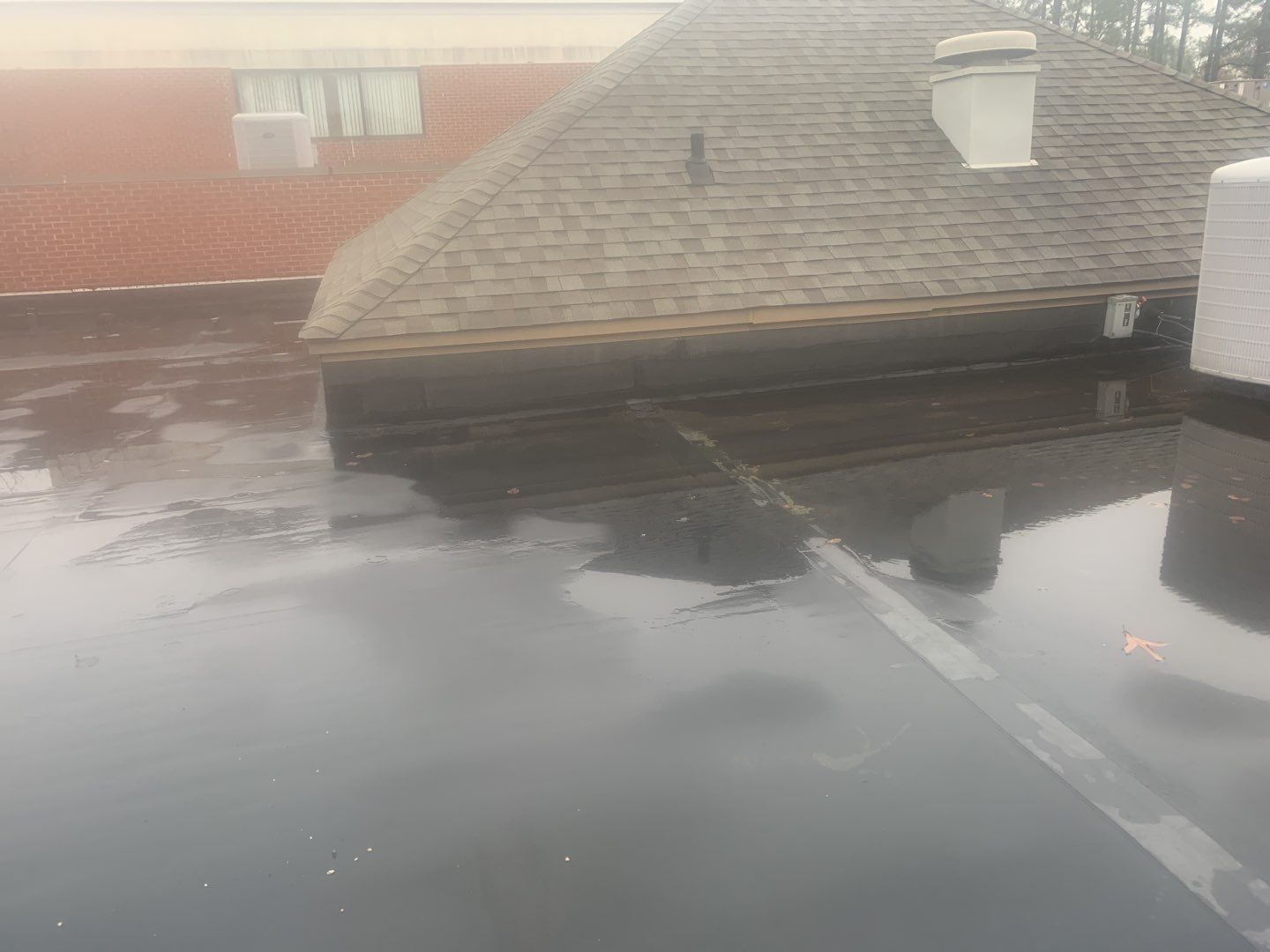 Re Roof (TPO) by American Roofing NC