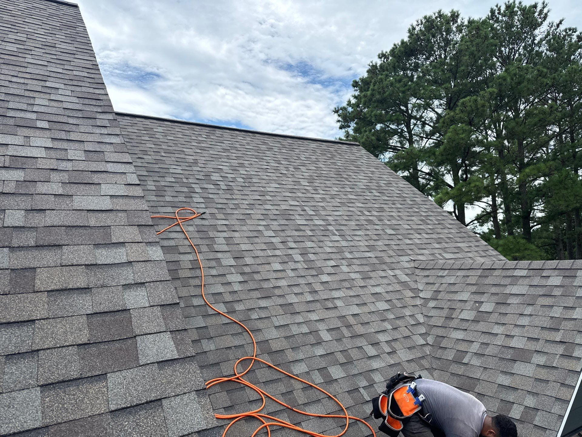 Roof Replacement and White Gutter Installation in Gloucester by Cade Construction