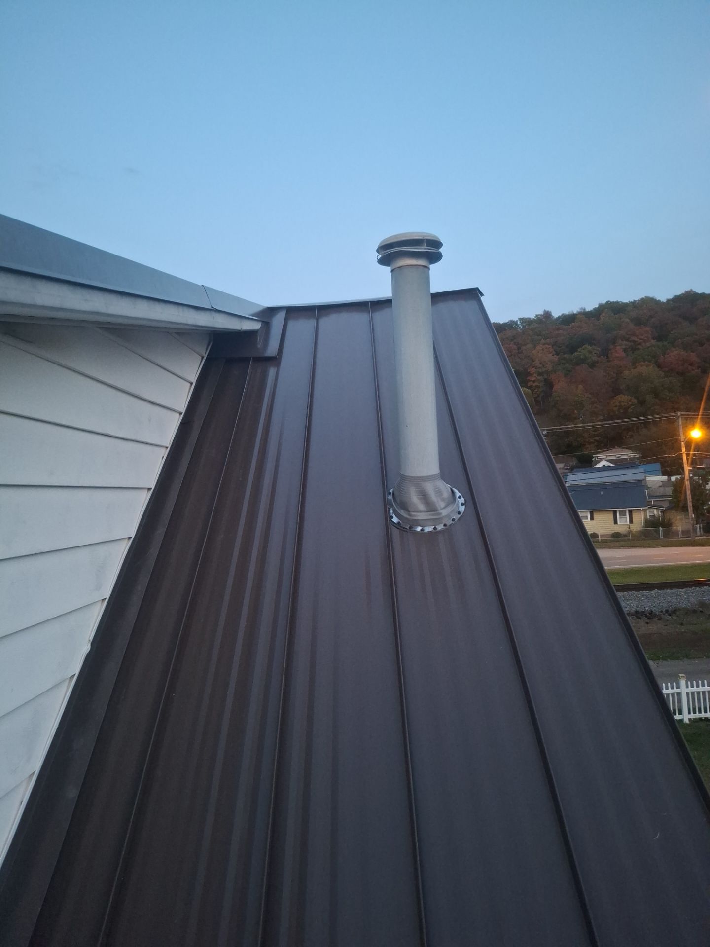 Residential Roofing Installation using Standing Seam Metal - 4766 by Rainstoppers Roofing