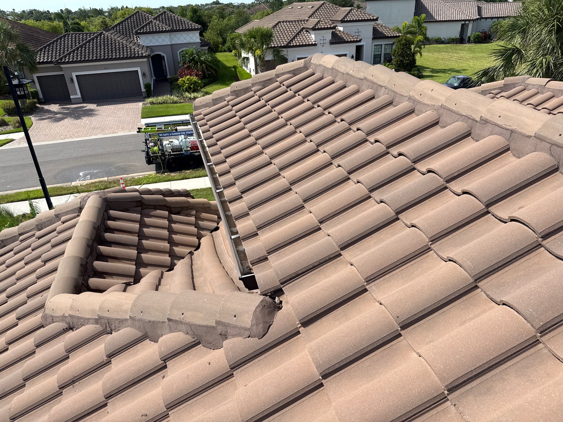 Soft Wash Roof Cleaning – Concrete Tile Roof | Artisan Lakes Esplanade, Palmetto, FL by Sunshine AquaWash