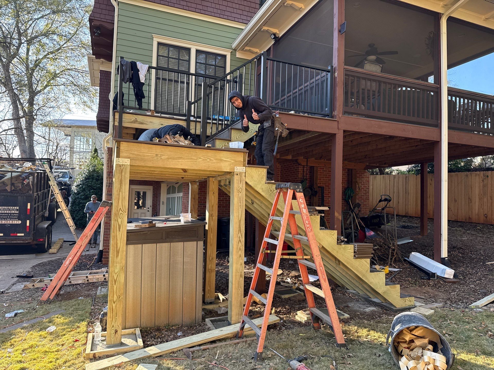 Deck Resurface using Trex and Deckorators ALX Contemporary railing by Nelson Exteriors 
