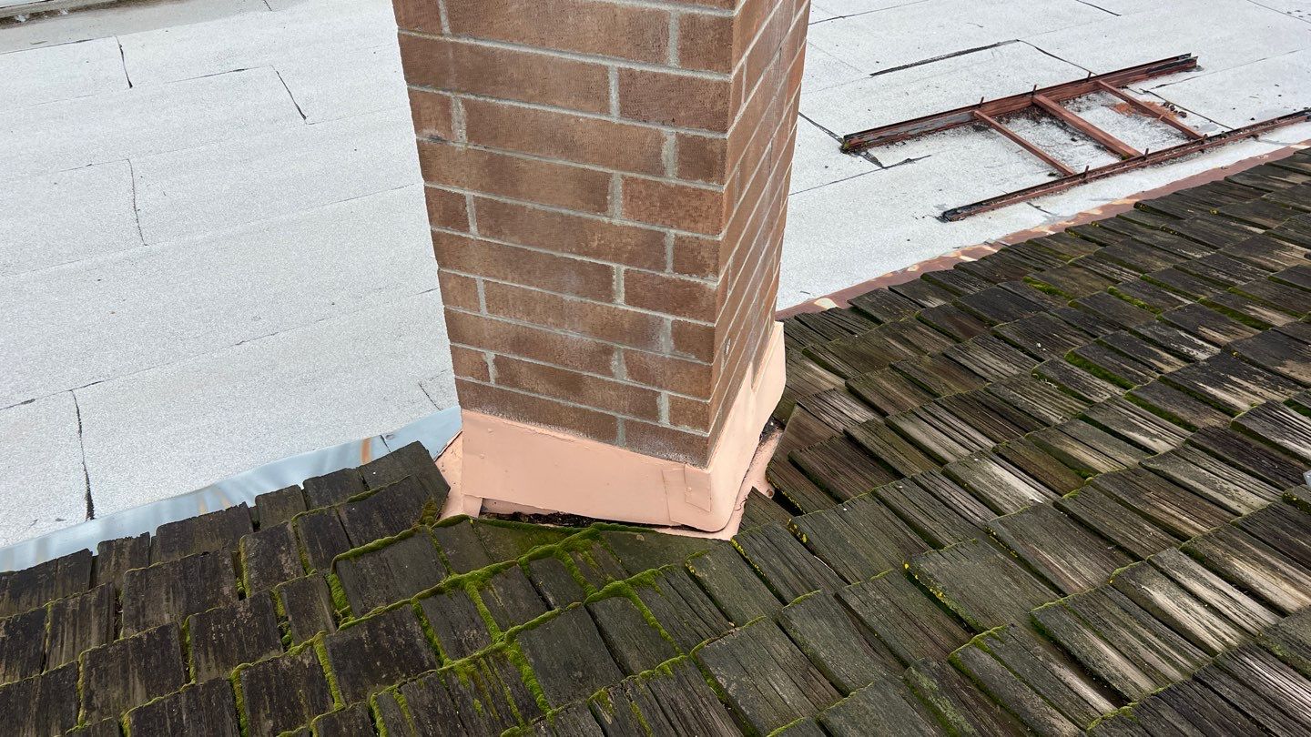 Installation of Certainteed Presidential shingles on residential house by Straight Edge Roofing Inc