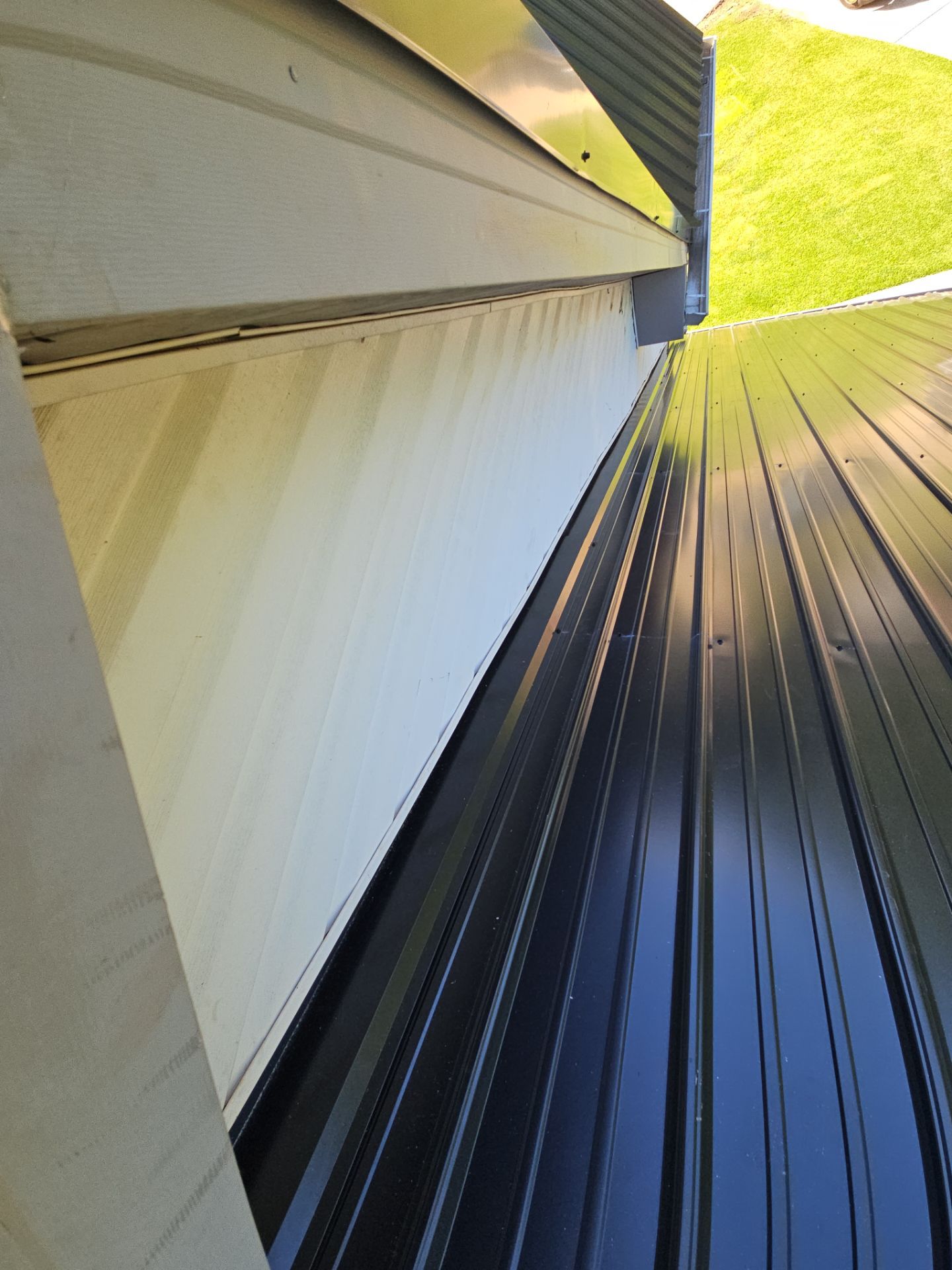 Metal Roof Replacement in Bessemer (Black) by The Roofing Dudes