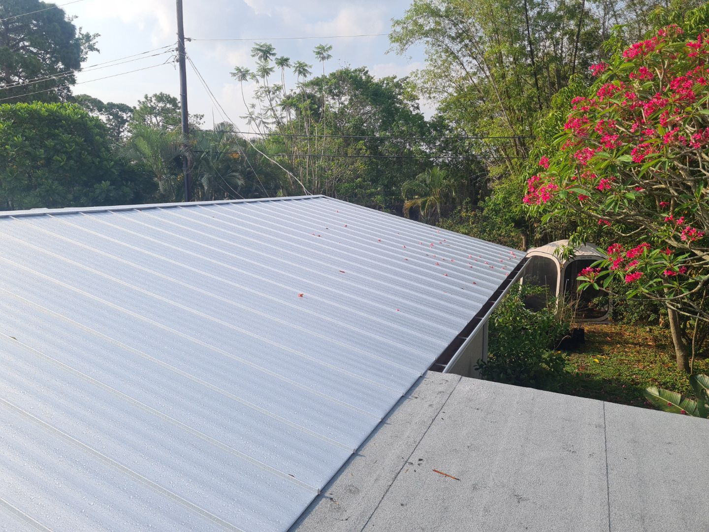 Residential Roofing Installation using 1" Nail strip metal roof by BLUES BROTHERS ROOFING