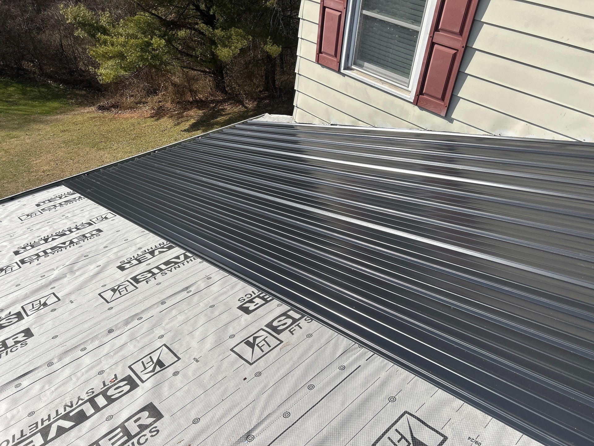 Residential Roofing Installation using Metal by Rainstoppers Roofing