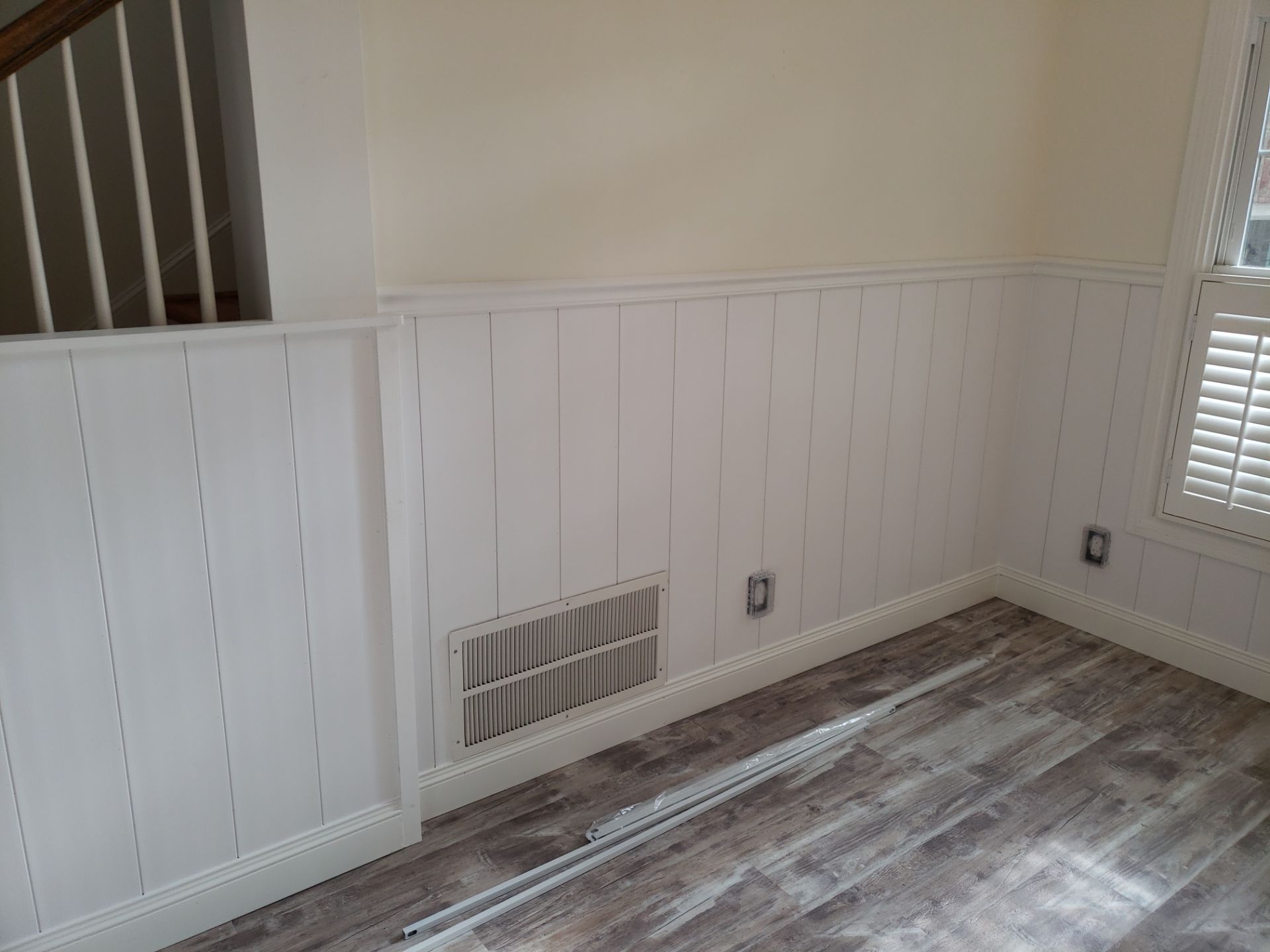 Front Room Transformed into a Waterproof Pet Room by A Step Above Handy LLC 