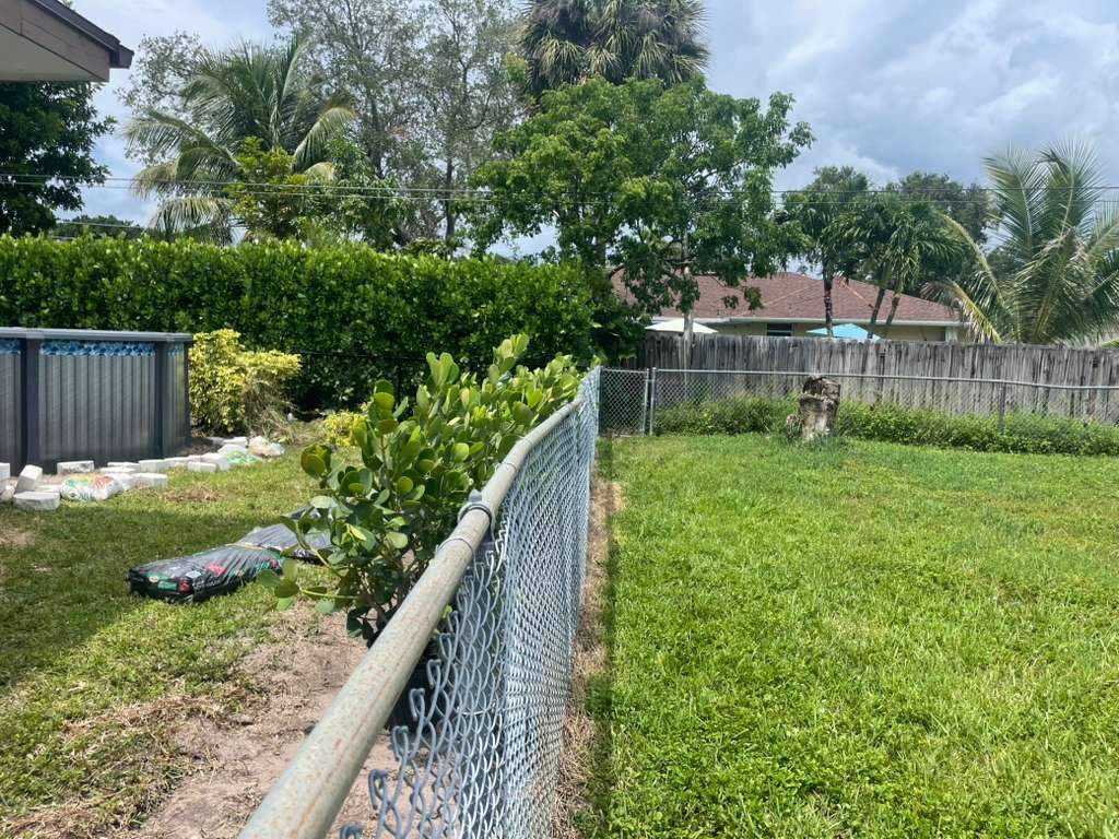 Residential Chain Link Fence Repair and Vinyl Privacy Gate Installation in Naples by True Fence LLC