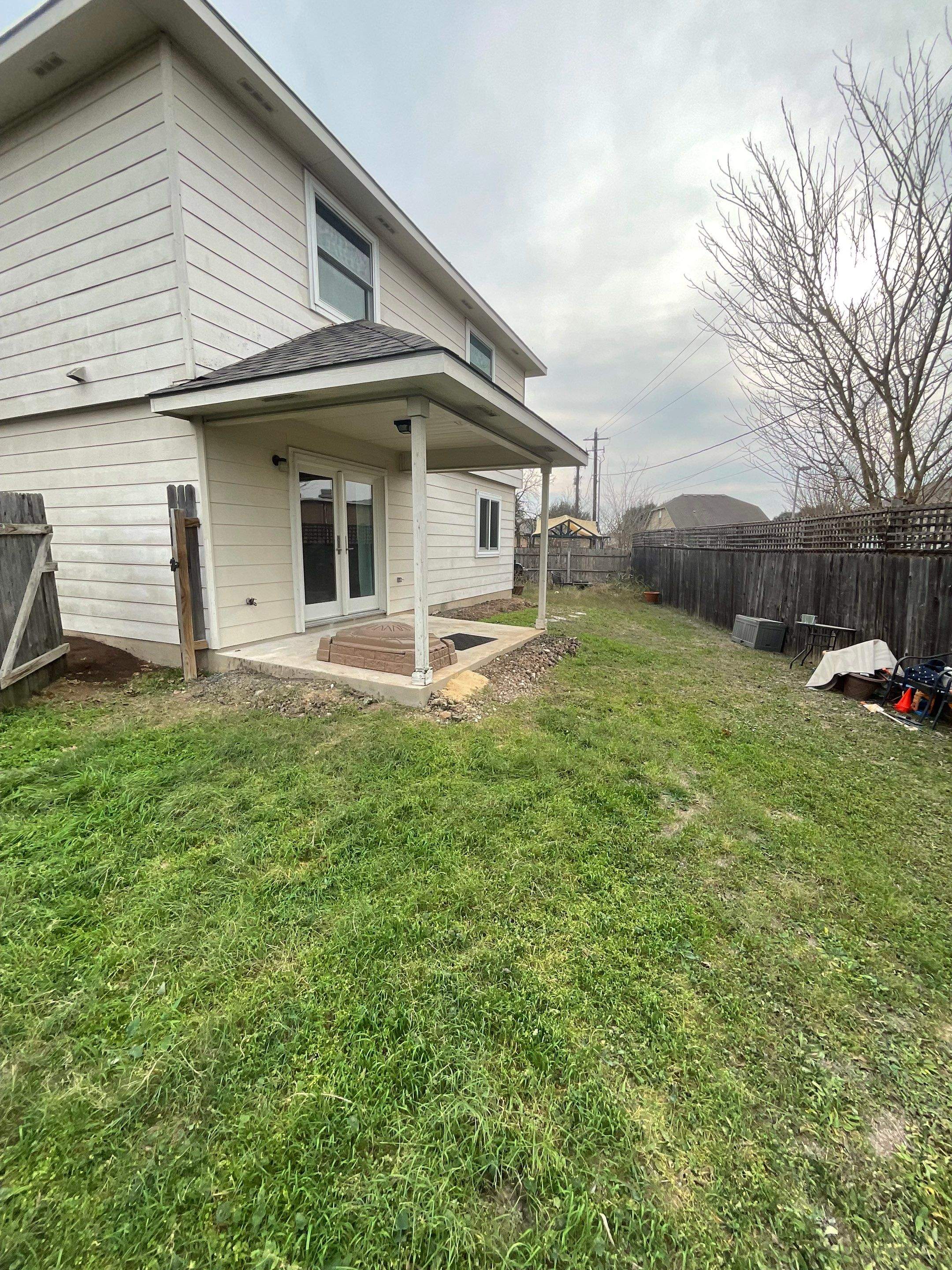 Horizontal Siding Replacement and Concrete Patio Installation in Lincoln by CompanyCam
