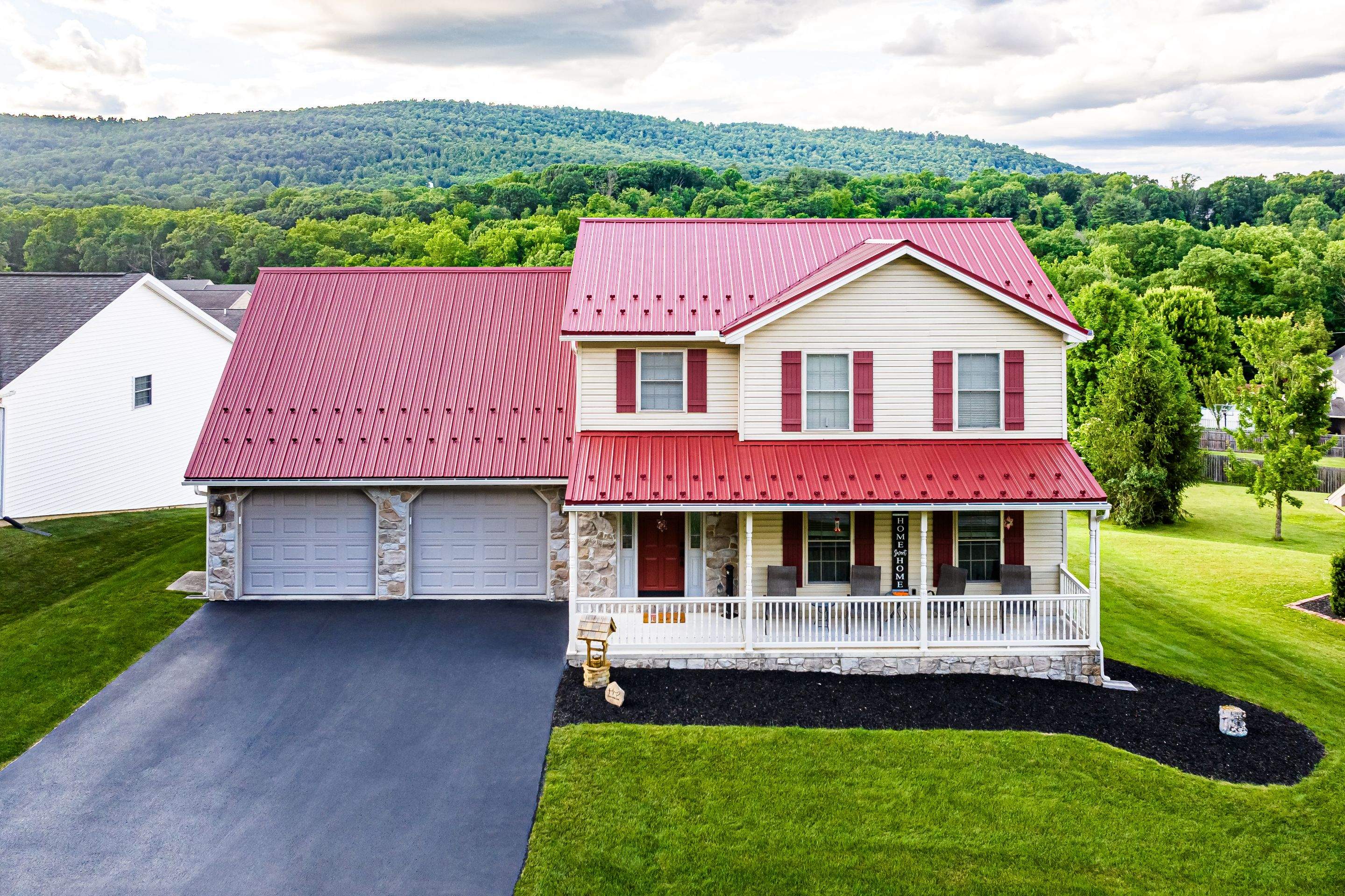 Metal roof-colonial red by Esh Builders