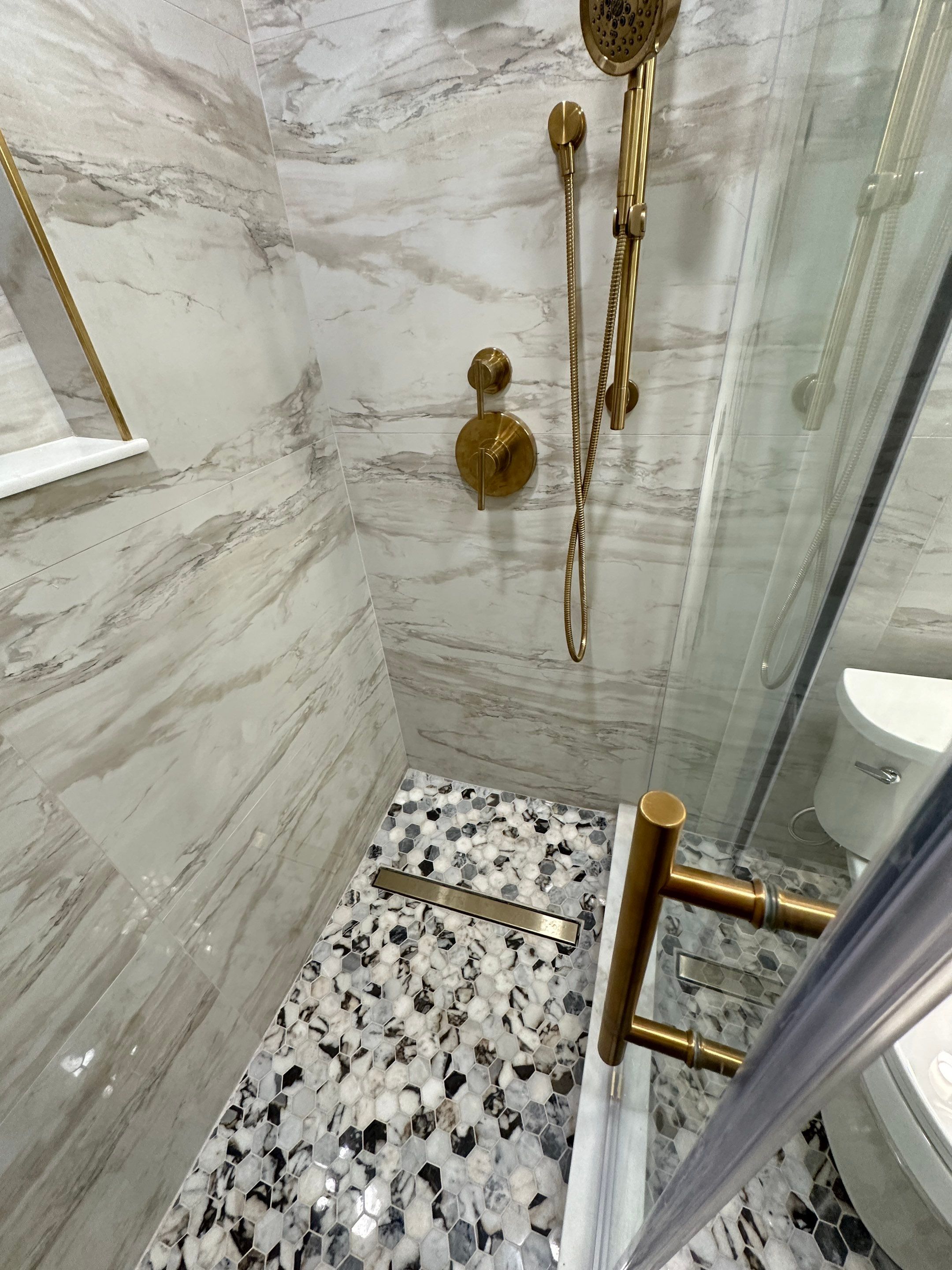 Bathroom Remodel using Tile by Home Concepts Construction