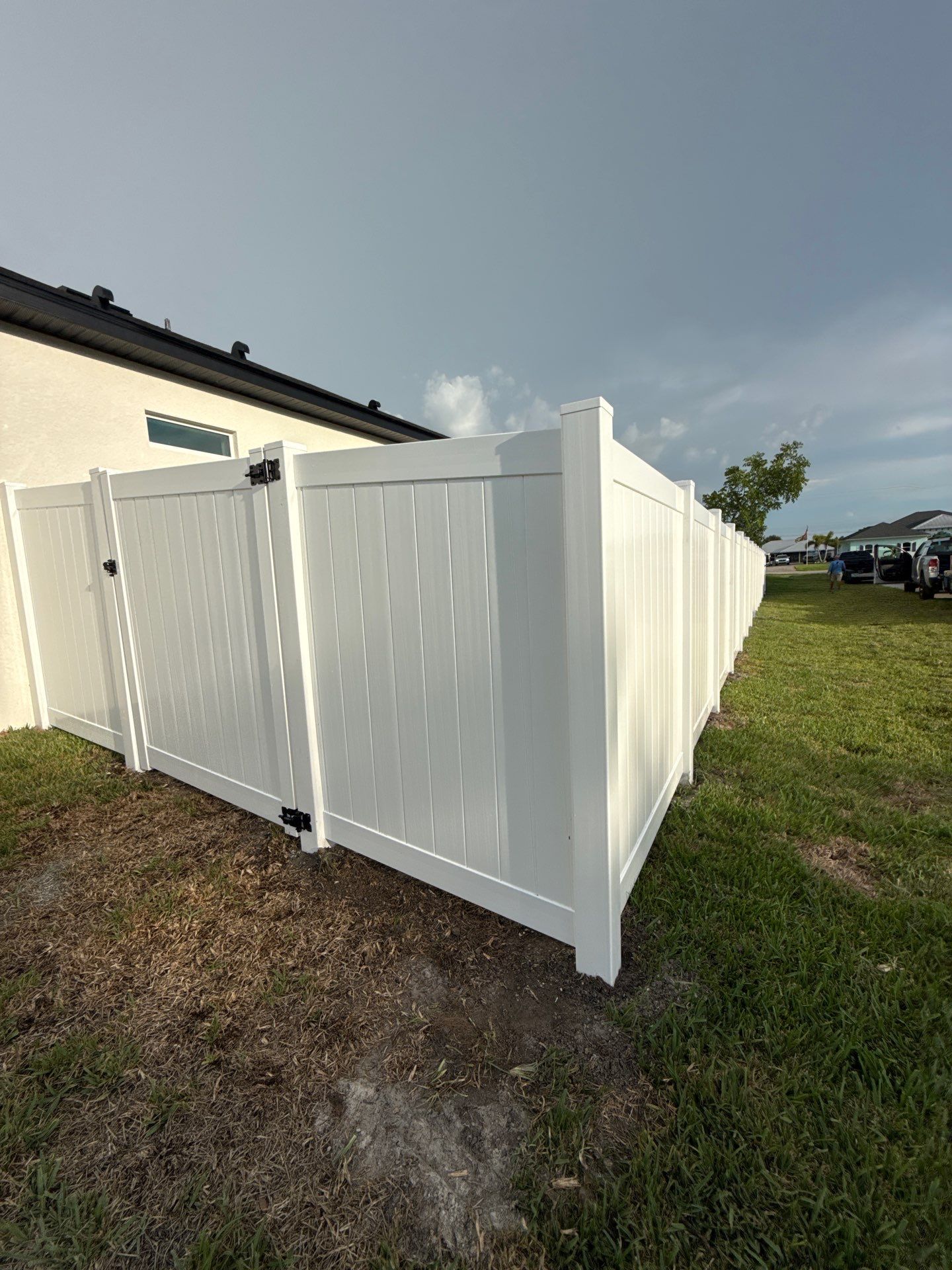 Residential Vinyl Privacy Fence Installation in Port Charlotte by True Fence LLC