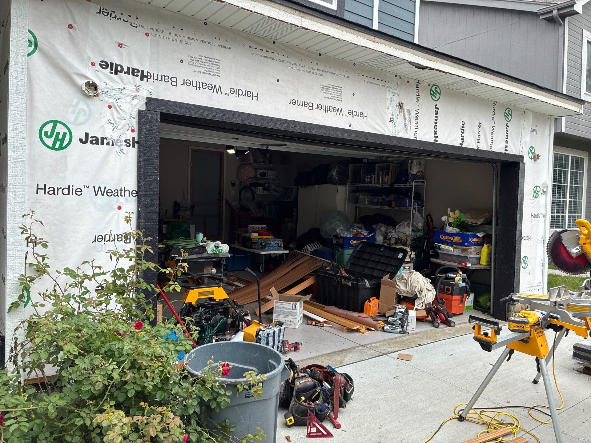 James Hardie Siding and Window Replacement with Arctic White Trim by Carps Complete Exteriors
