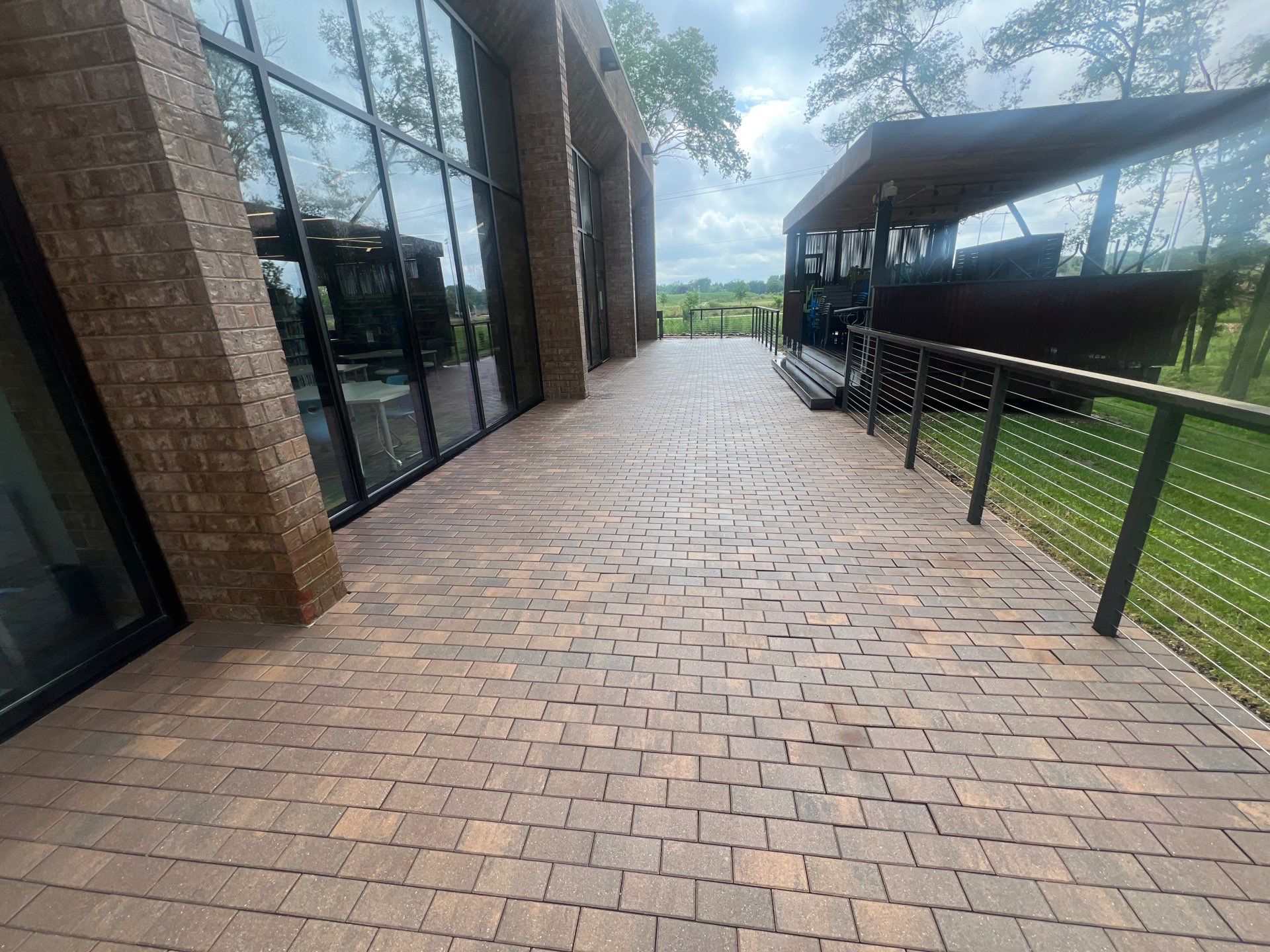 Brick paver repair, cleaning, sealing and poly sanding by Northern Power Washing LLC.