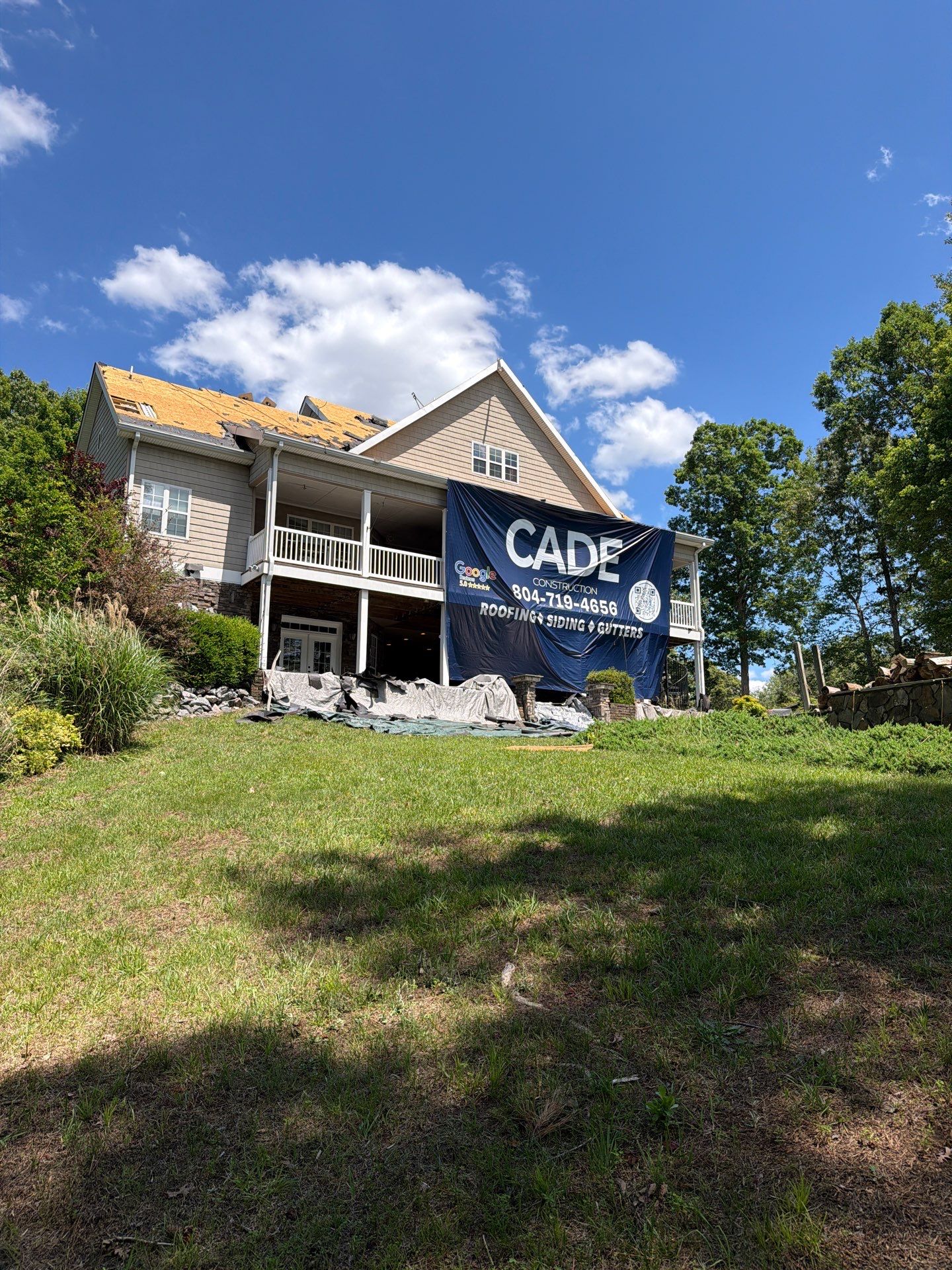 Lancaster Roof Replacement Featuring Architectural Shingles and Attic Insulation by Cade Construction