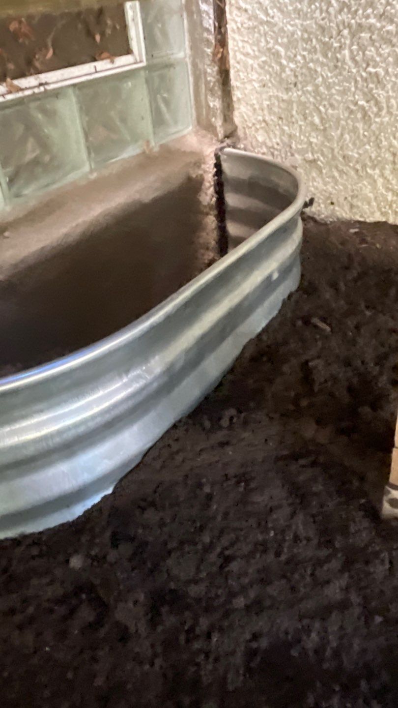 Window Wells & Foundation Grading in South Minneapolis by Waterproofing Northeast