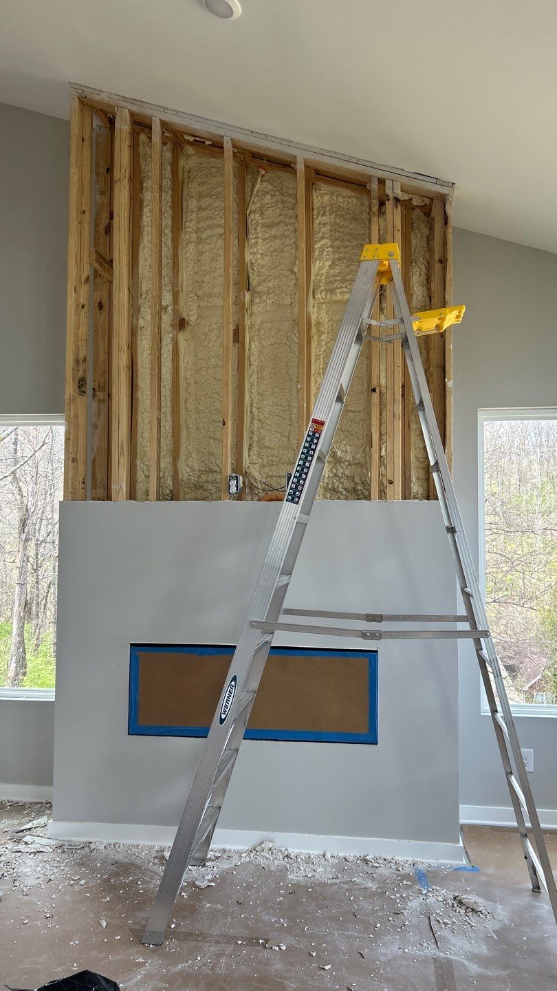 Floor to Ceiling Fireplace Surround by Footprints Floors of Nashville