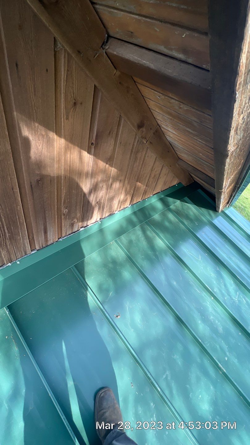 Shingle to Standing Seam Metal Roof by Springtree Restoration 