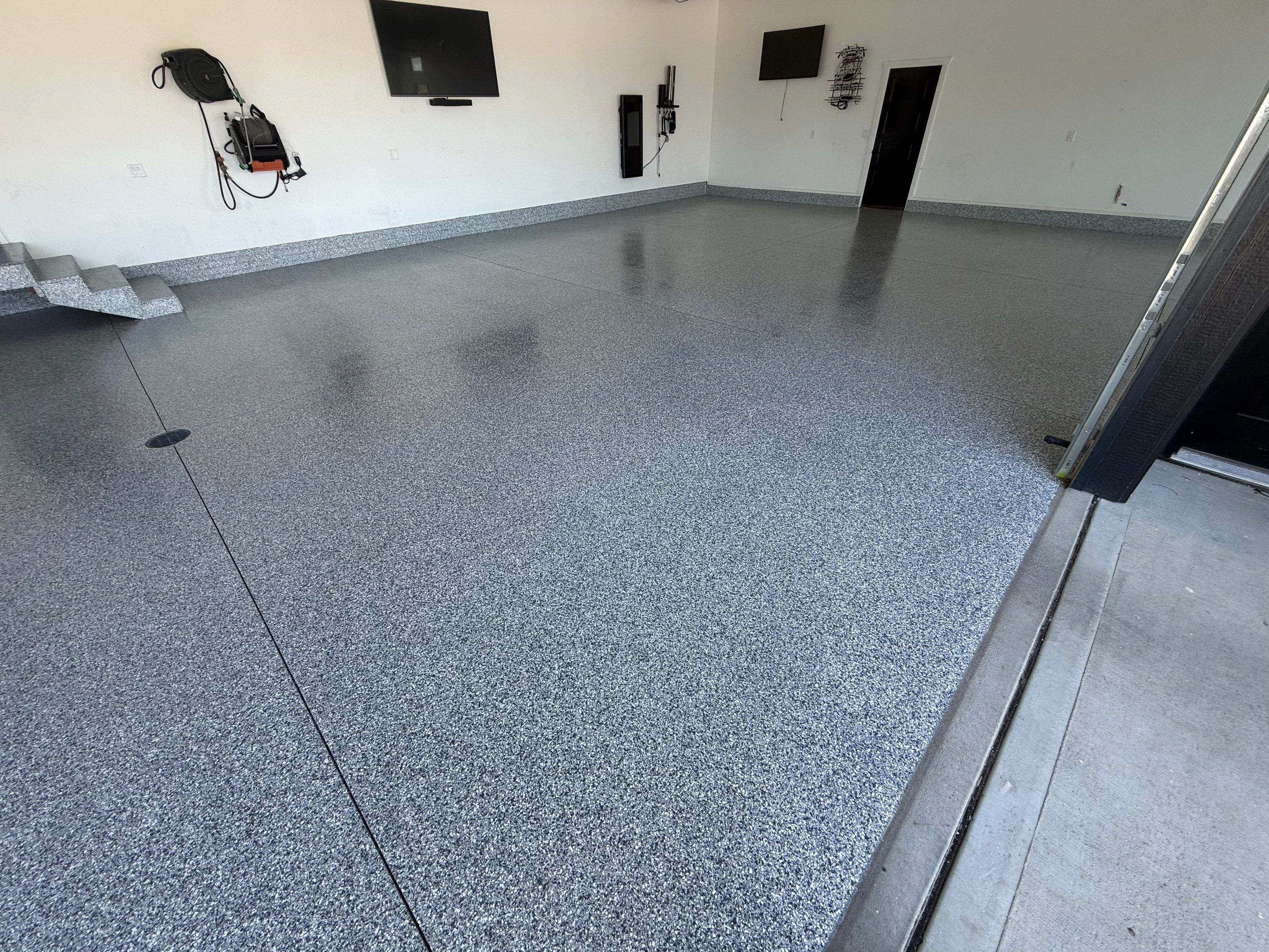 Gravel Flake Garage Floor Coating in Yankton by Select Painting, Coatings & Garage Cabinets