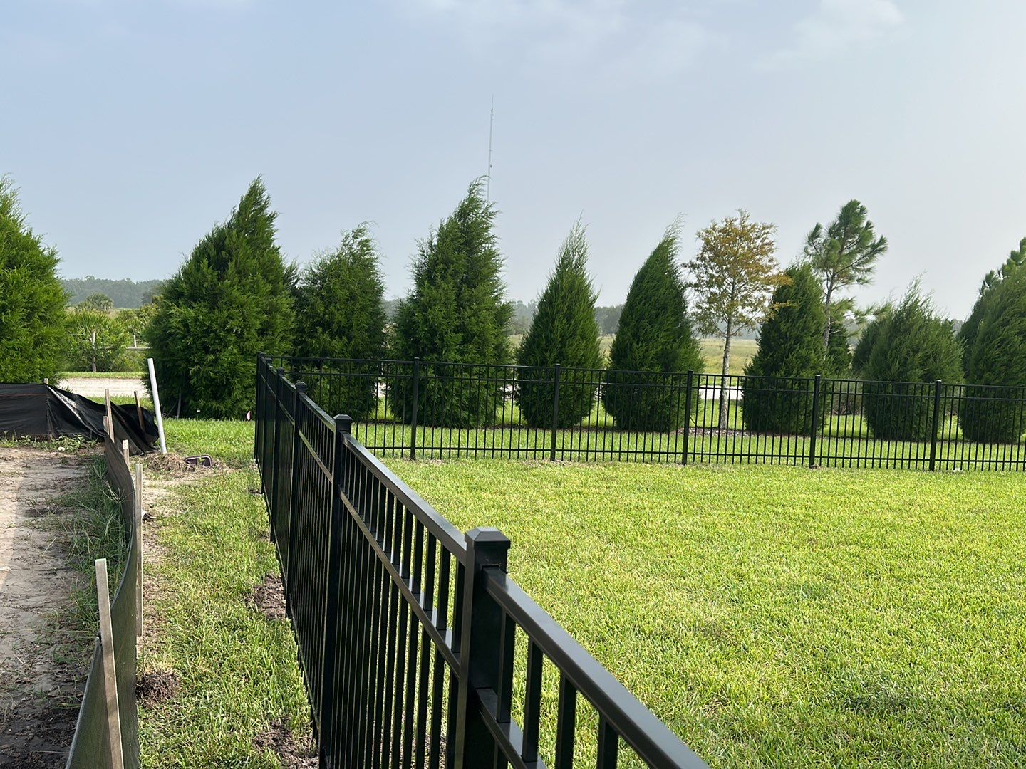 Aluminum Fence Installation using Black 3 Rail Aluminum Fence by Asap fence and gates, LLC