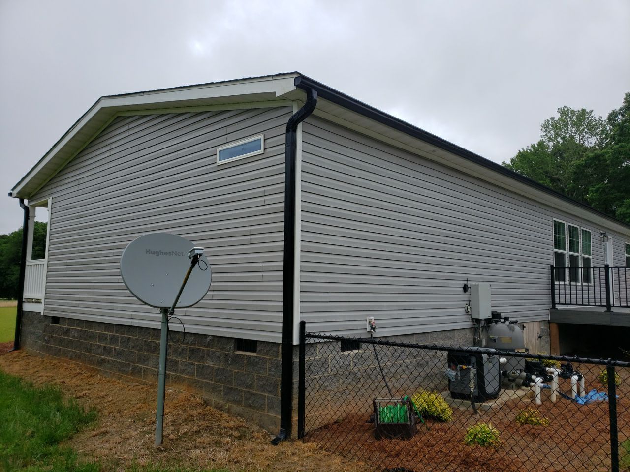 House Wash using cleaner by Power Wash Masters LLC