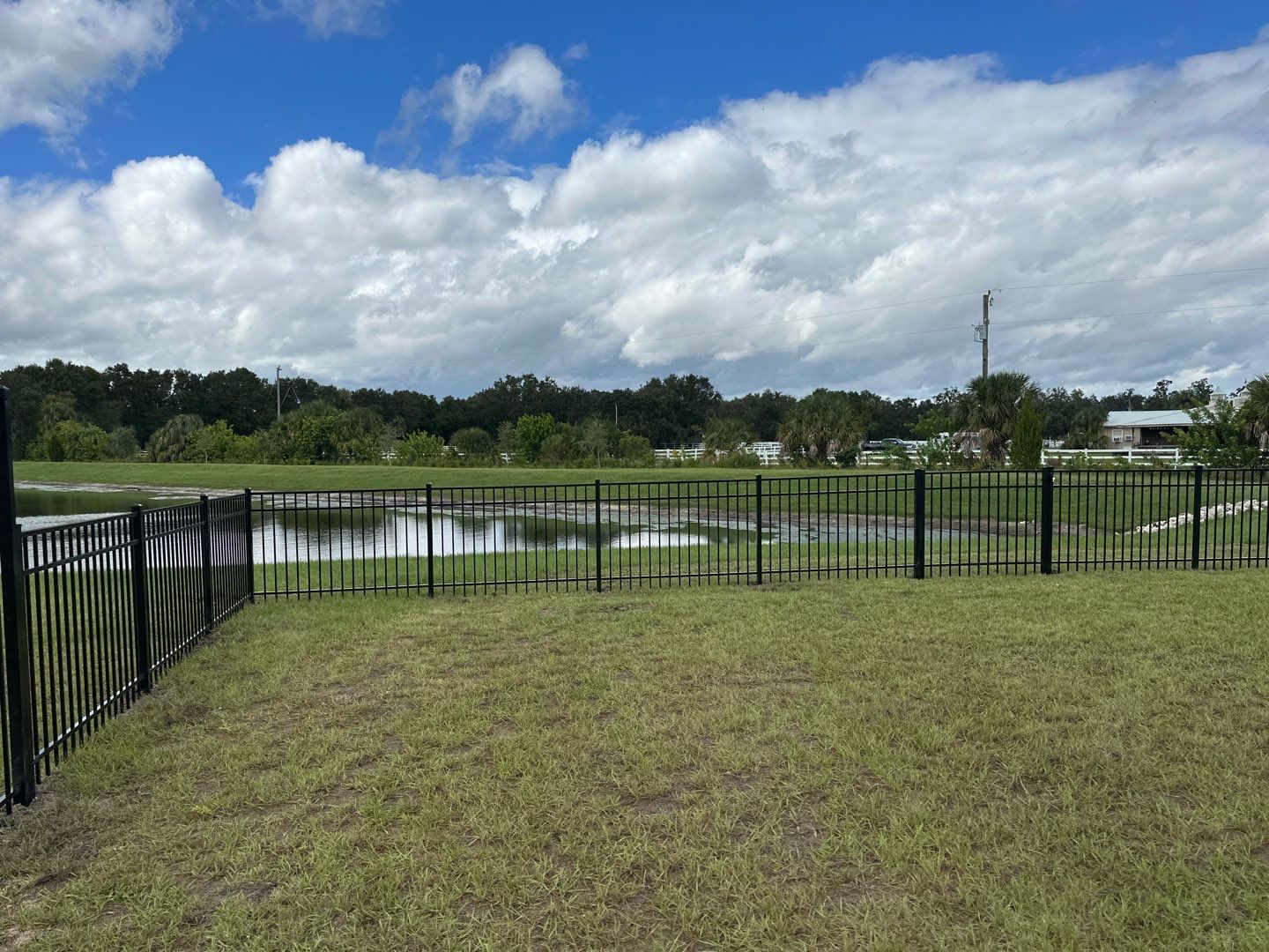 Aluminum Fence Installation using Black 3 Rail Aluminum Fence by Asap fence and gates, LLC