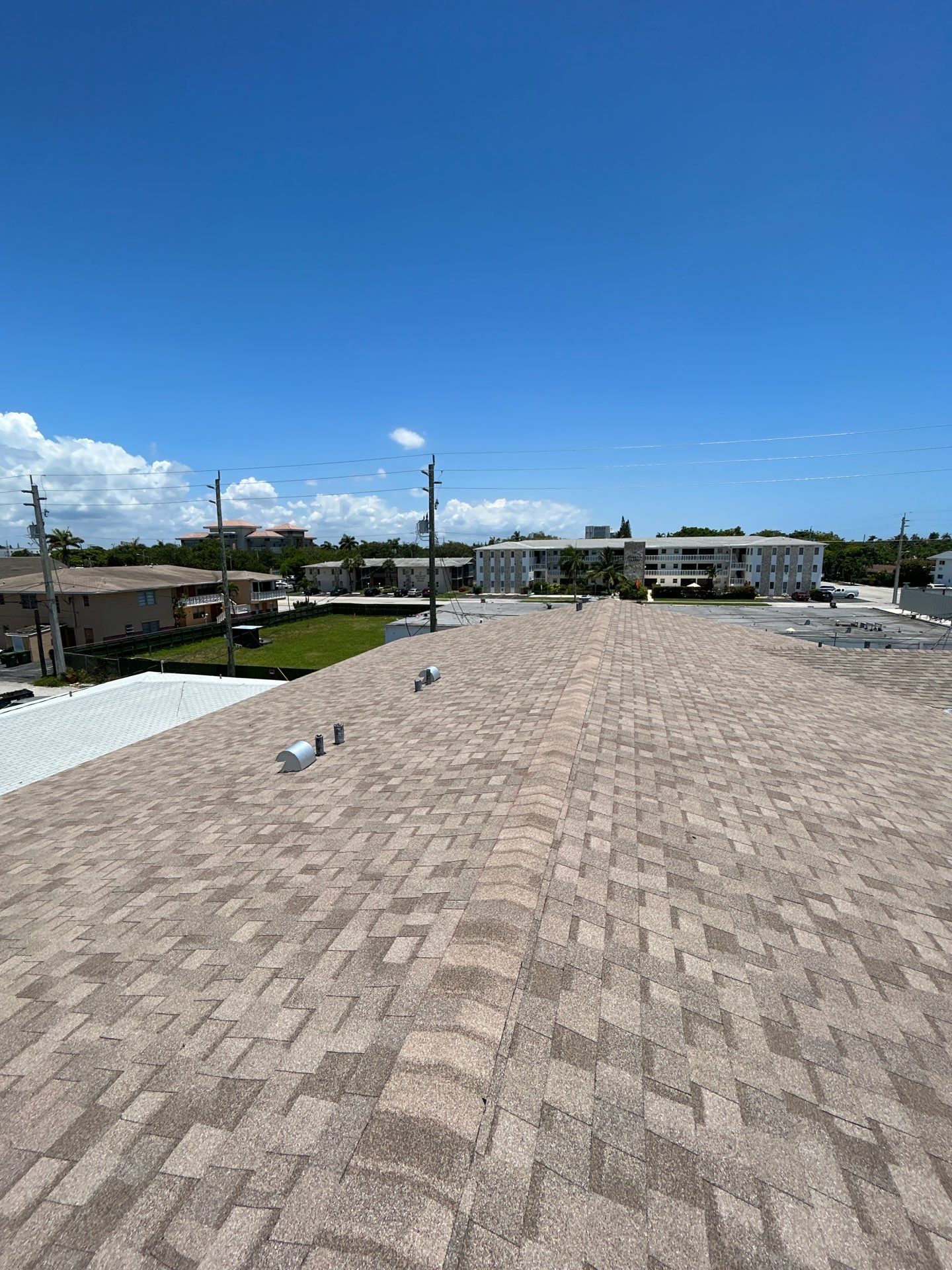 Commercial Roofing Installation using CERTAINTEED LANDMARK AR (SUNRISE CEDAR) by Earl W. Johnston Roofing 