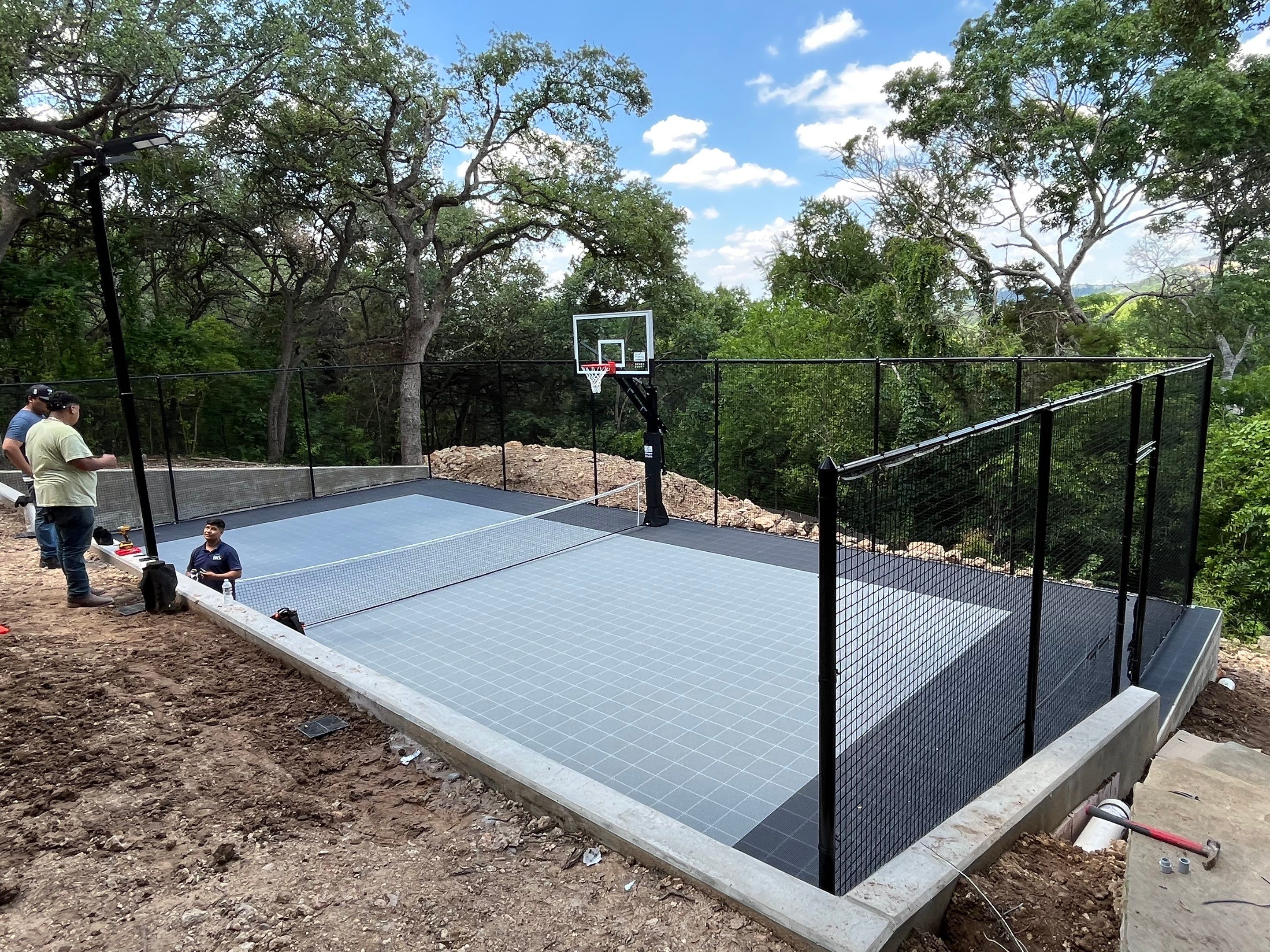 T Family 30x55 West Austin Court by Sport Court Austin