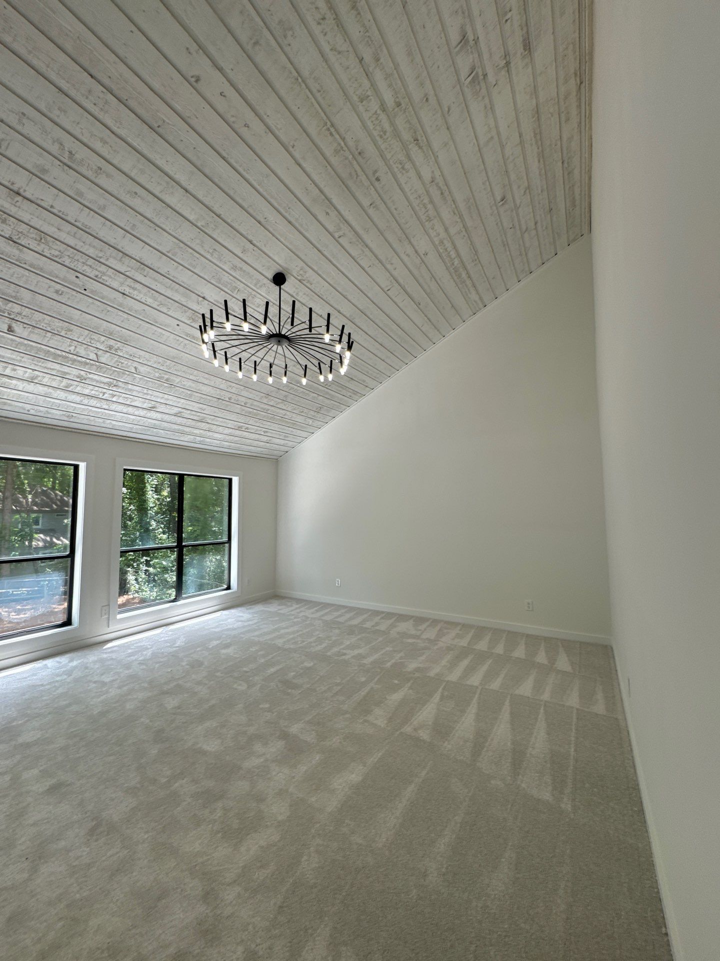 Modern Marietta Home Transformation with Custom Kitchen and Vertical Siding by Swift Home Renovations