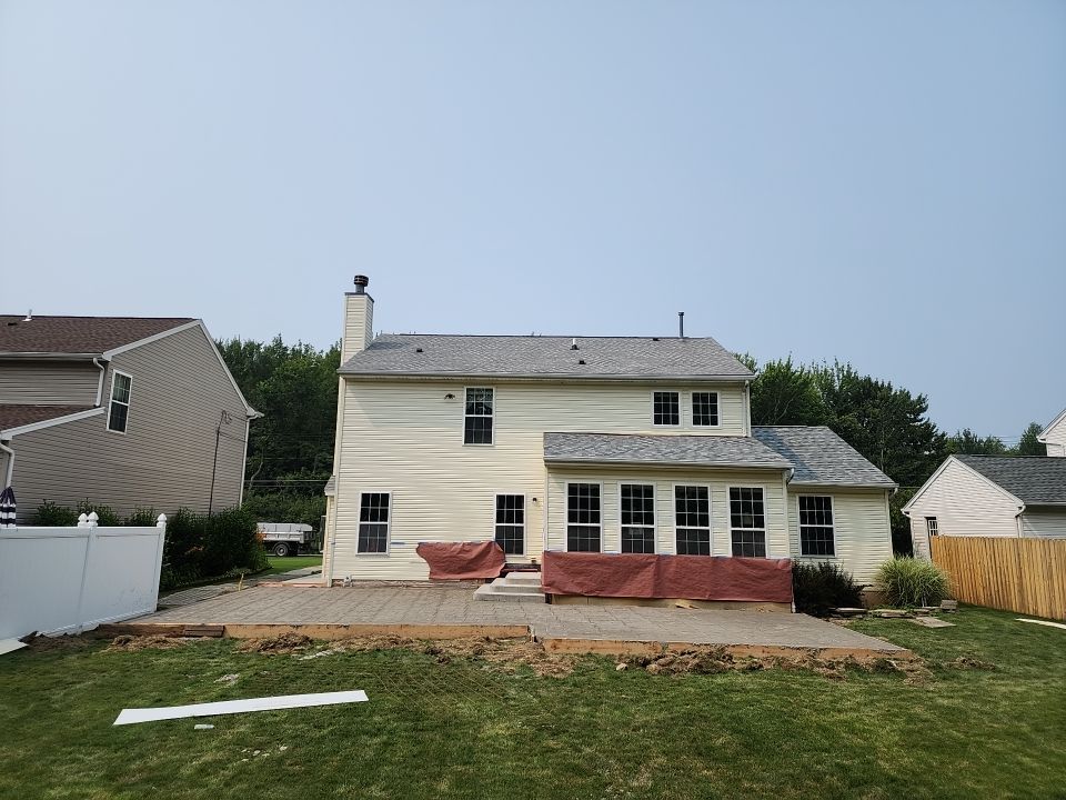 Stamped Concrete, Entry Door, and Concrete  by Ivy Lea Construction