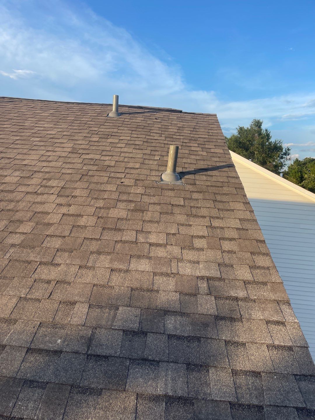 Residential Roofing Installation using Roof Replacement by American Roofing & Construction LLC