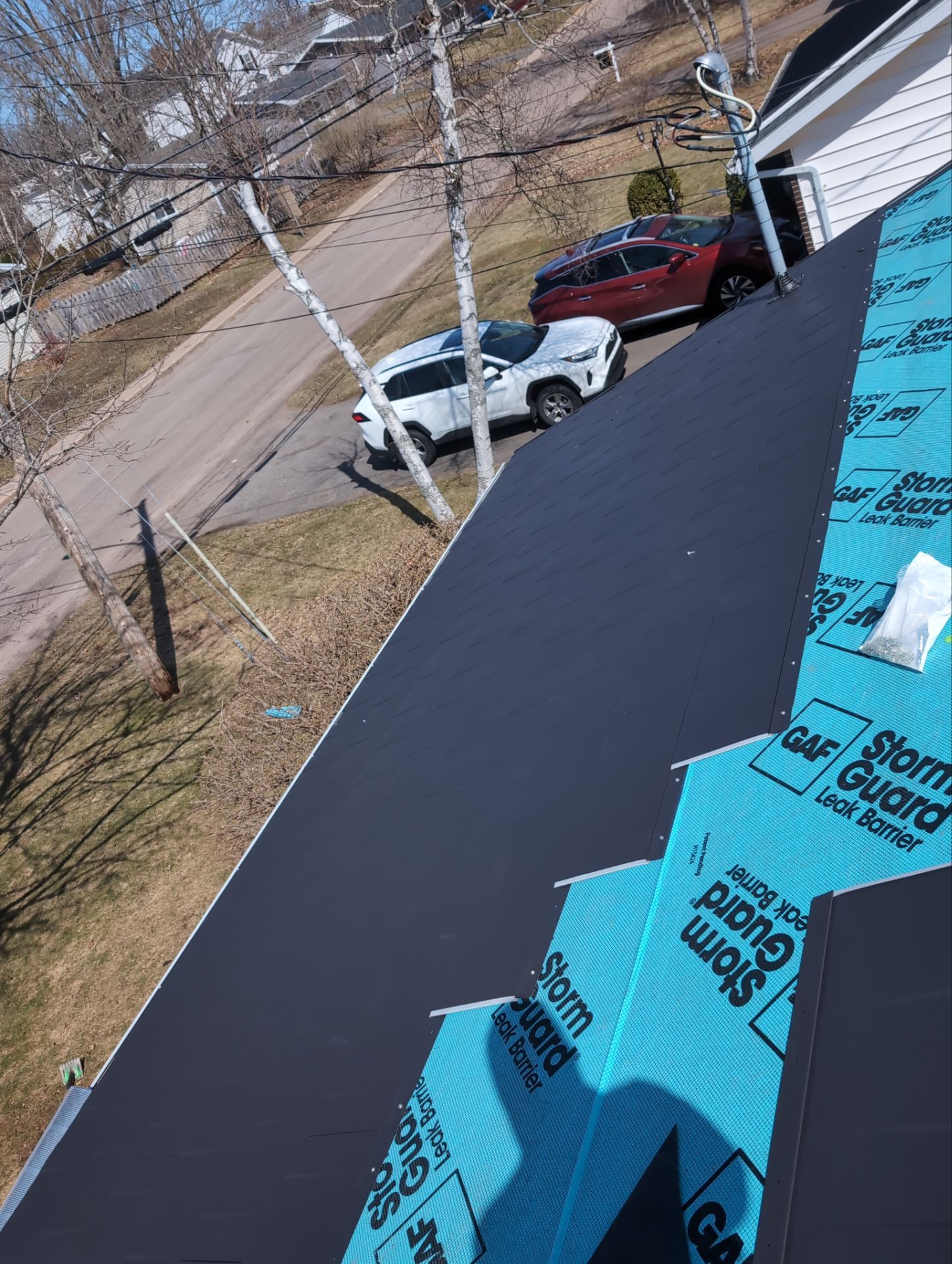 Residential Roofing Installation using Wakefield Bridge Steel Shingle by Ideal Steel by Artisan Roofing & Home Improvements Inc.