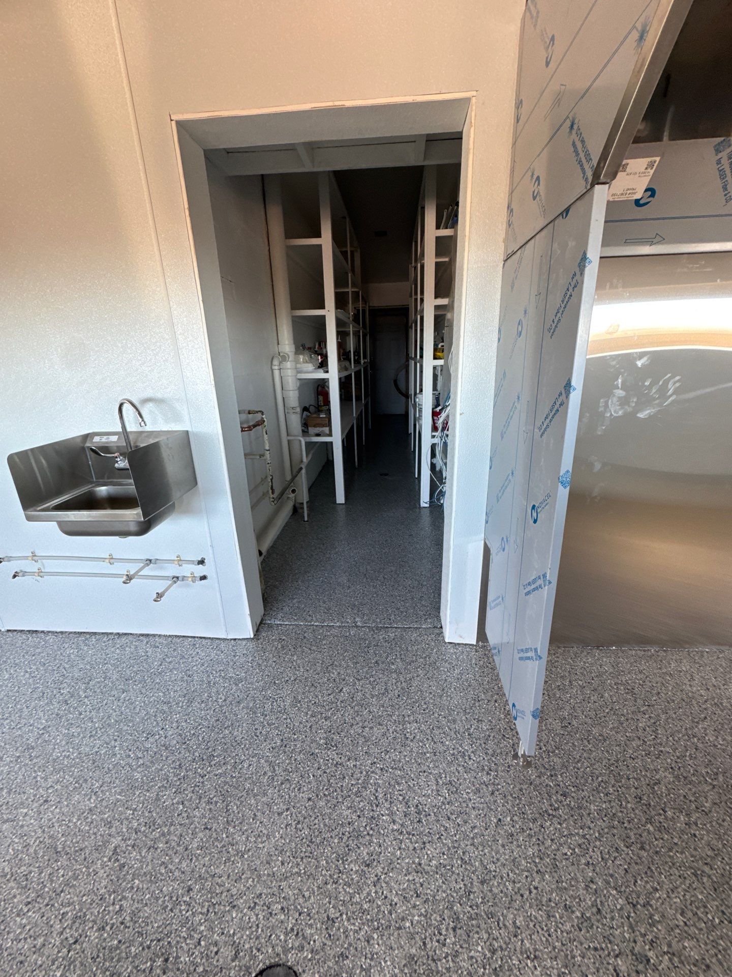 Commercial Restroom Refresh: Seamless 'Tidal Wave' Flake for a Repeat Client by Performance Floors & Coating