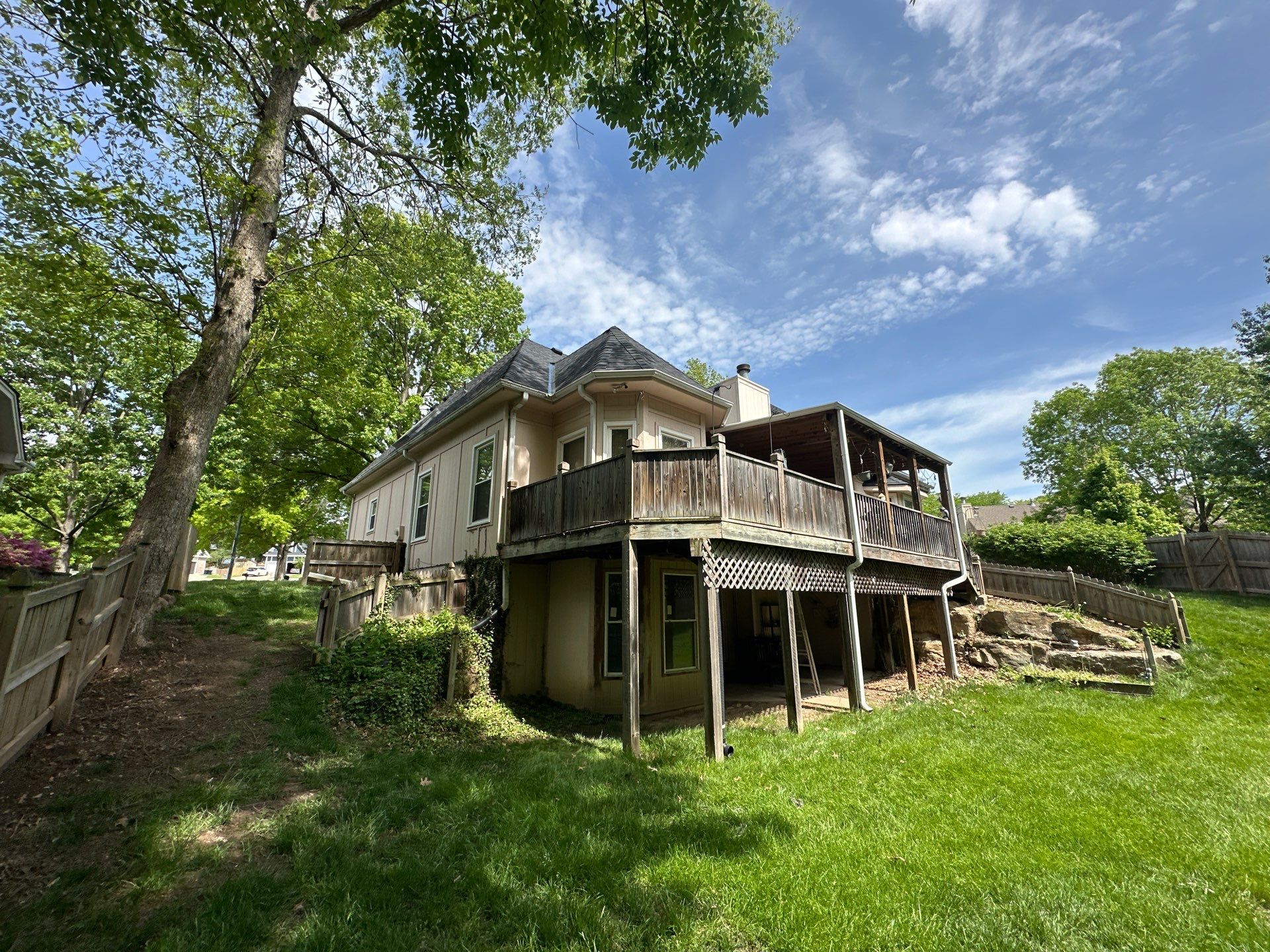 Comprehensive Roof Replacement and Skylight Installation in Kansas City by Liberty Roofing