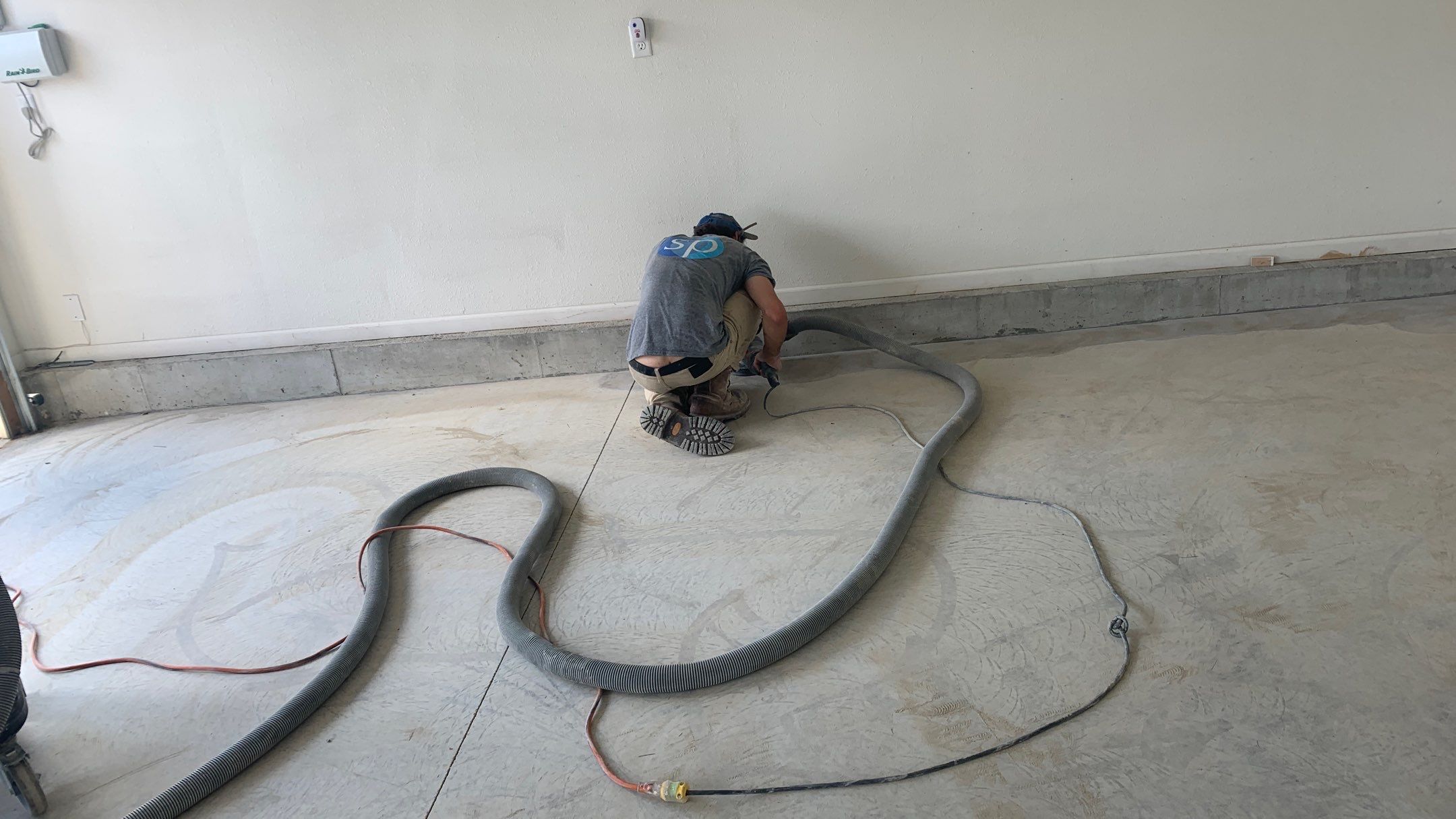 Garage using Pebble Beach by Select Painting, Coatings & Garage Cabinets