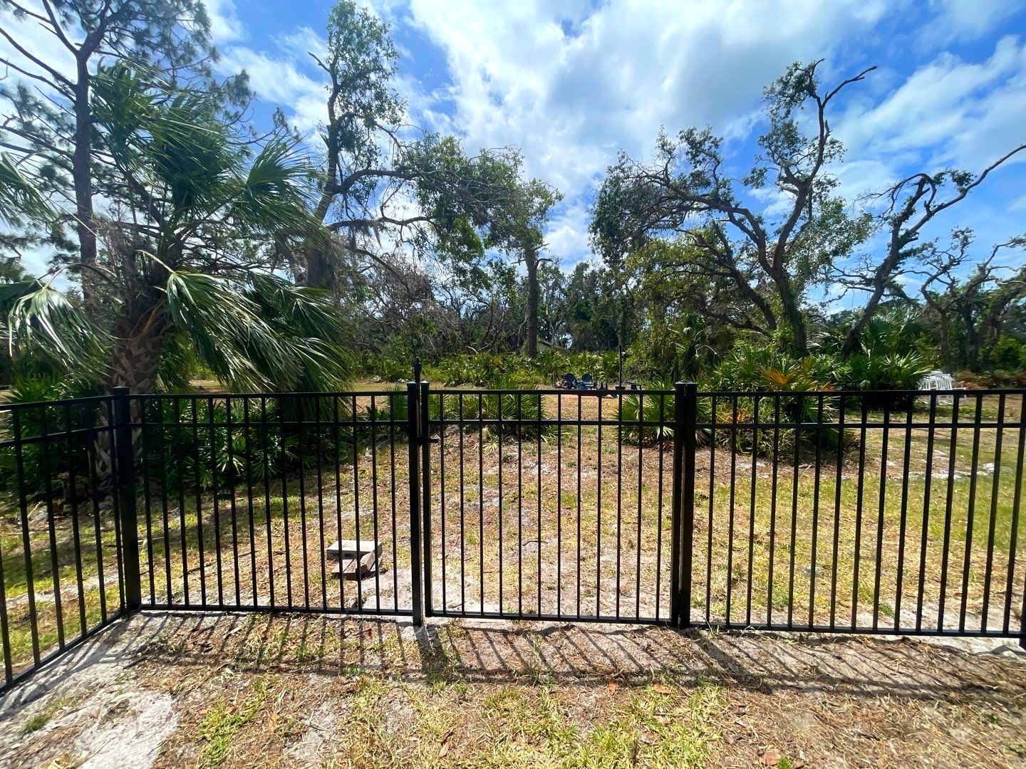 Black Aluminum 3 Rail Fence and Treated Wood Board on Board Privacy Fence  by Asap fence and gates, LLC