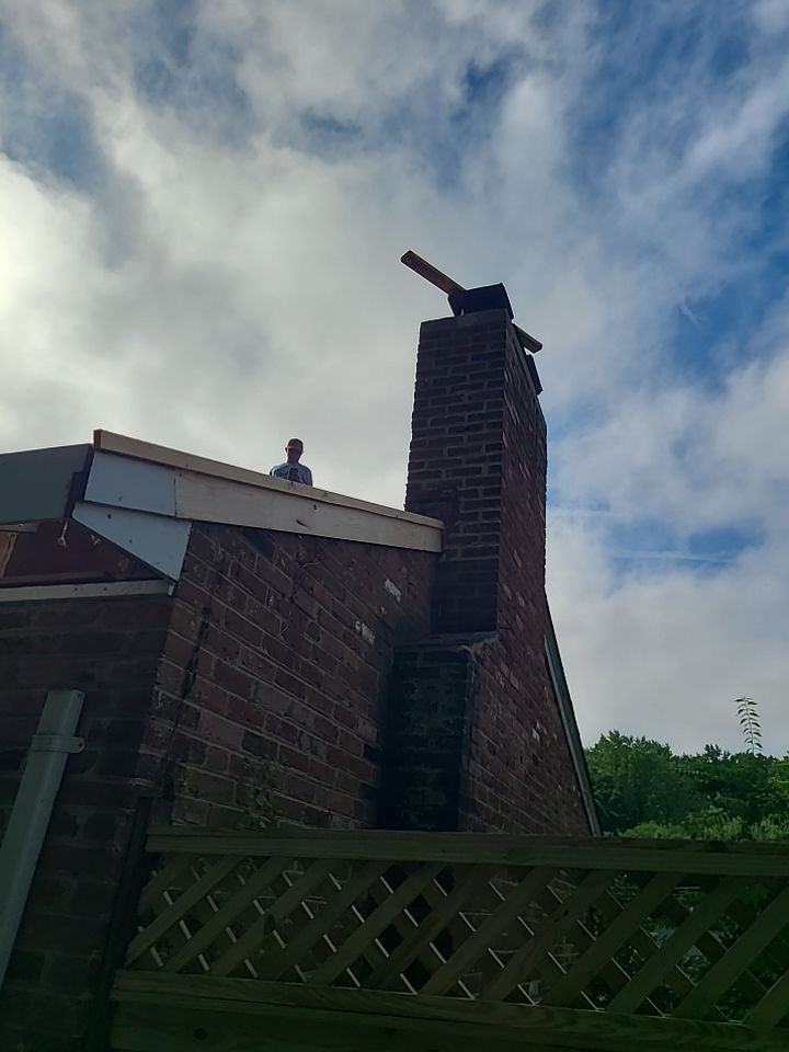 Springfield Tree Damage Restoration: CertainTeed Landmark Designer Shingles in Charcoal Black by RM Banning, Inc.