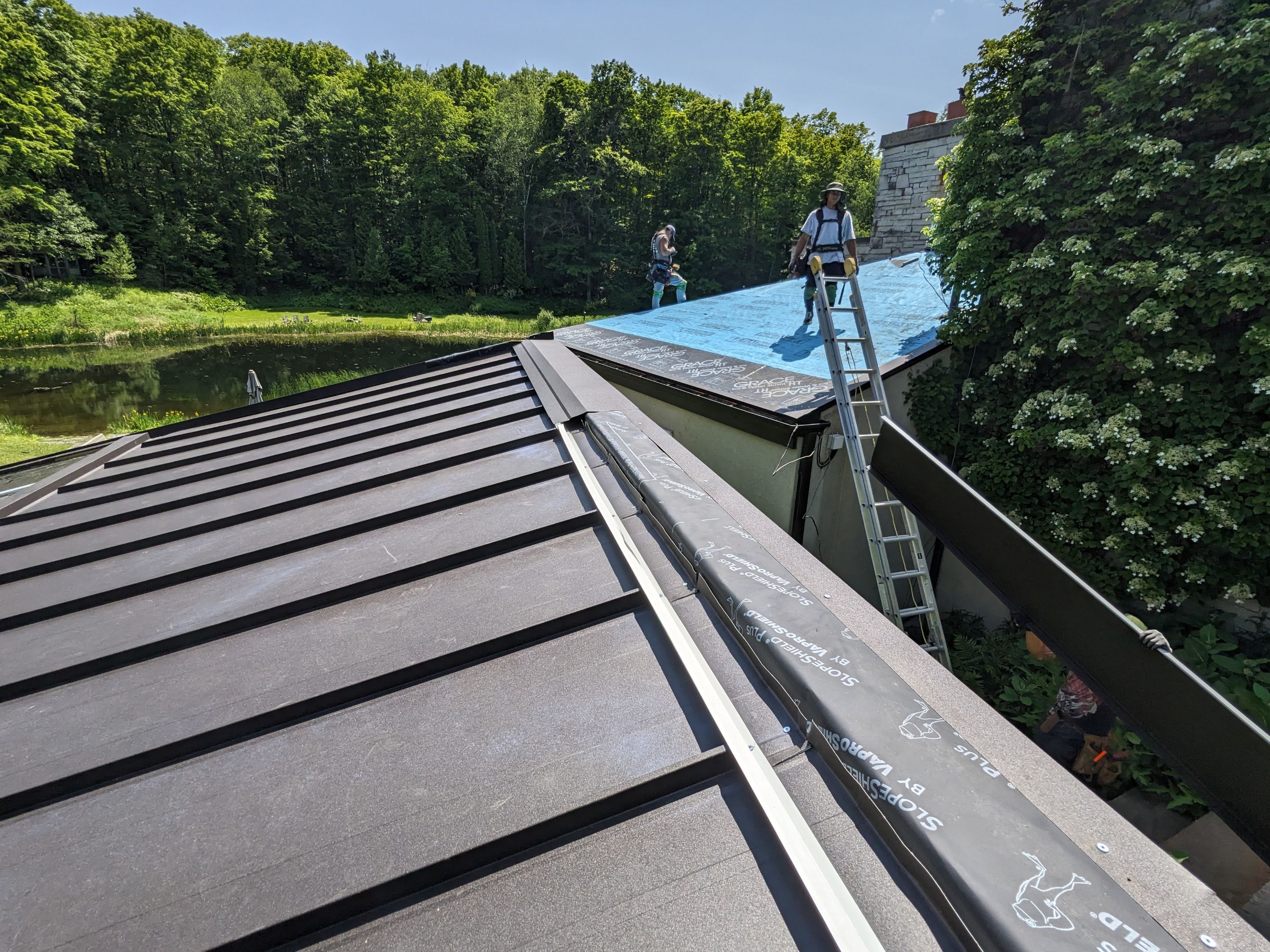 Roof Replacement using 16" Standing Seam Panels by Jay Carter Roofing & Sheet Metal