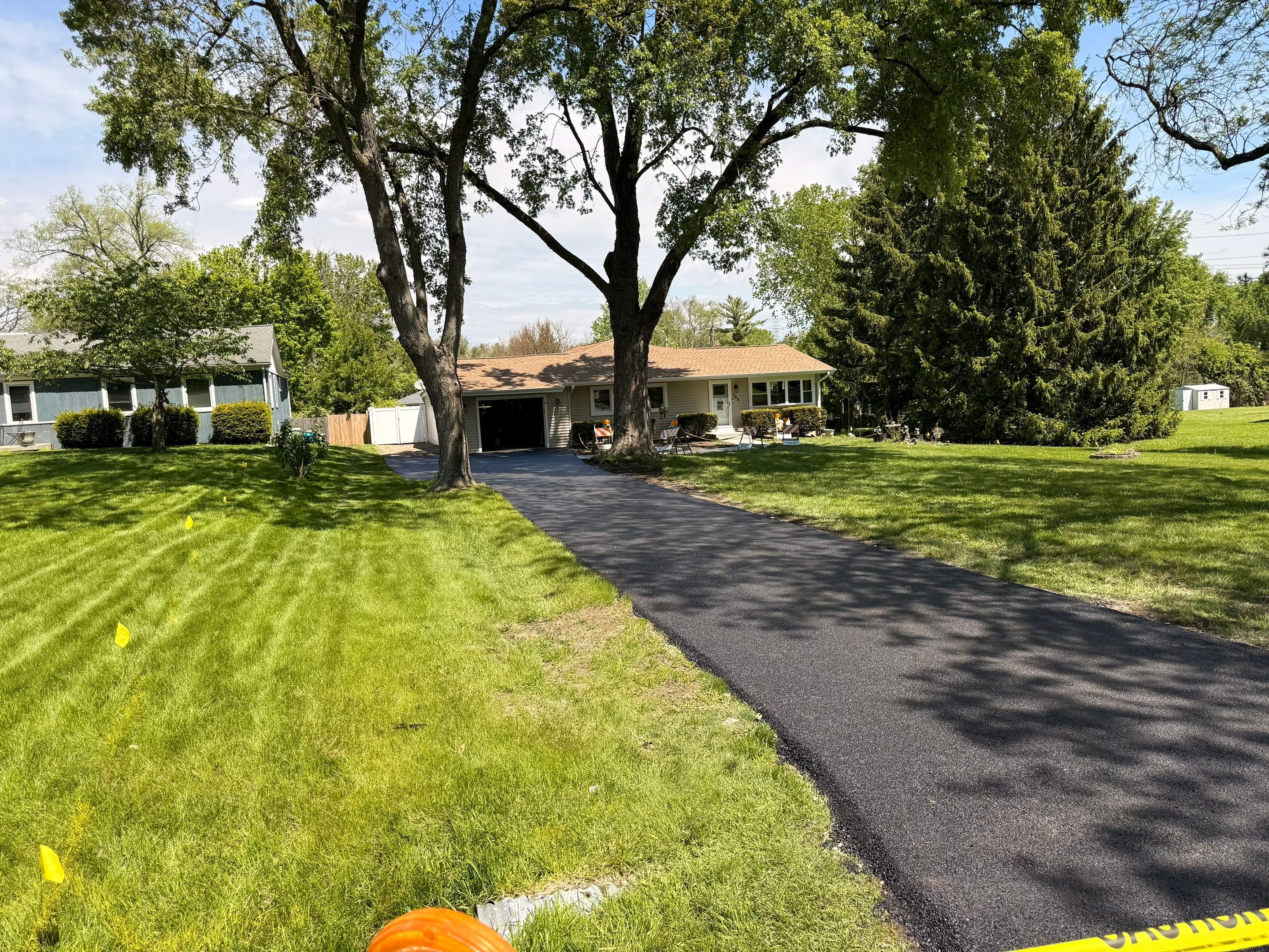 full asphalt driveway replacement by PaveRight Concrete&Asphalt LLC