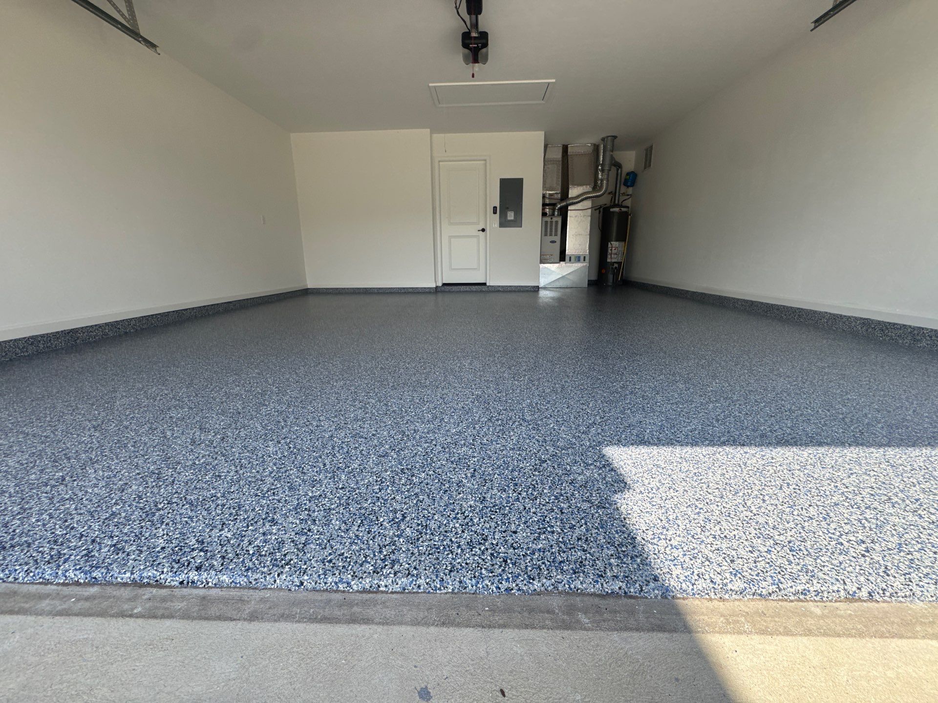 Garage Project in Newberry, FL in Denim by Cross Creek Concrete Coatings