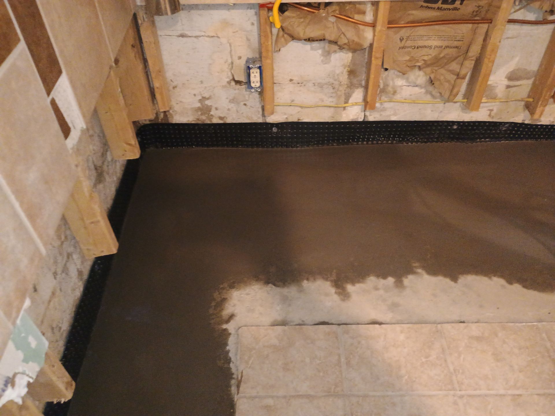 Drain Tile in Minneapolis for Kristen & Taylor by Waterproofing Northeast