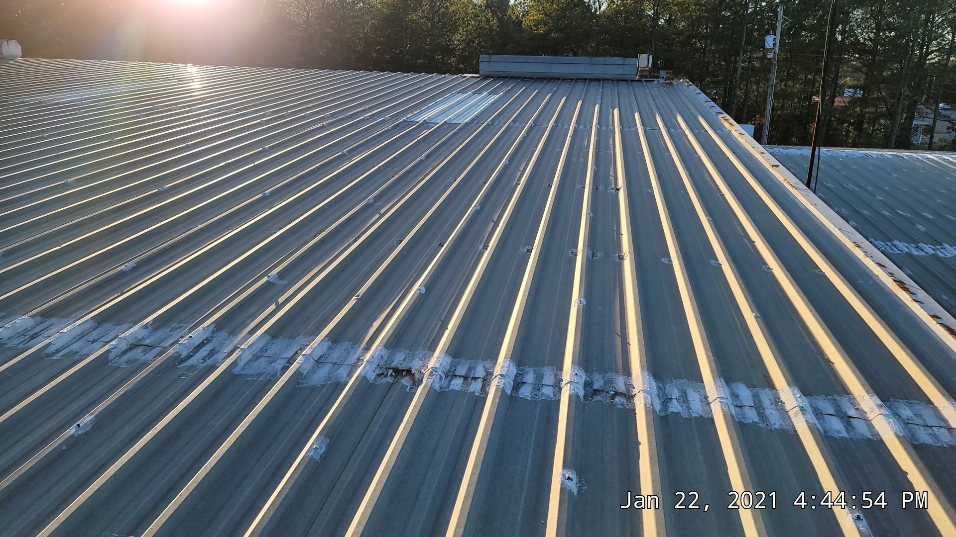 Commercial Roofing Installation using Aldocoat Coatings by Hostetler Roofing