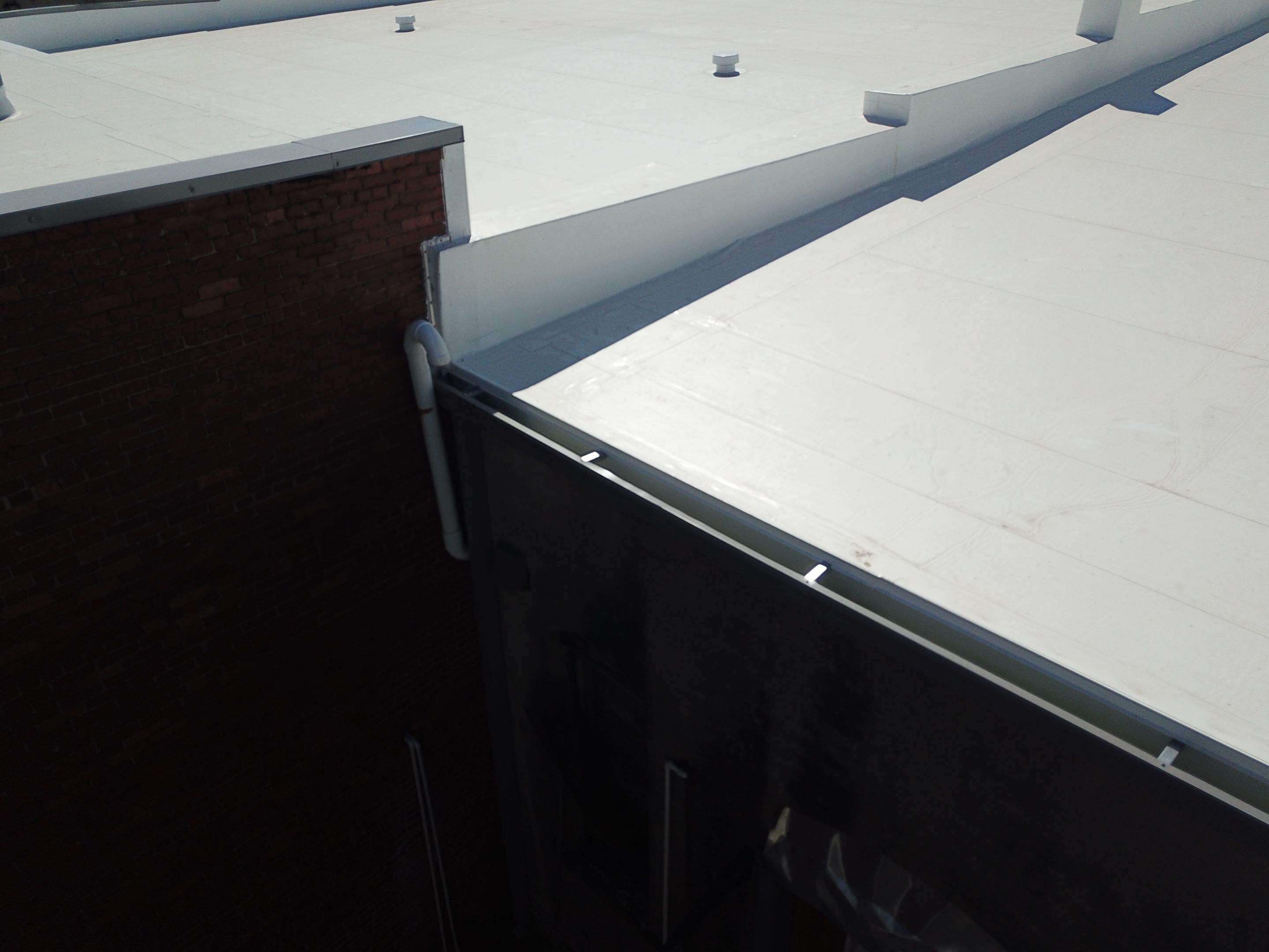 Commercial Roofing Installation in DeQueen, AR, using 50 mil PVC by Hostetler Roofing