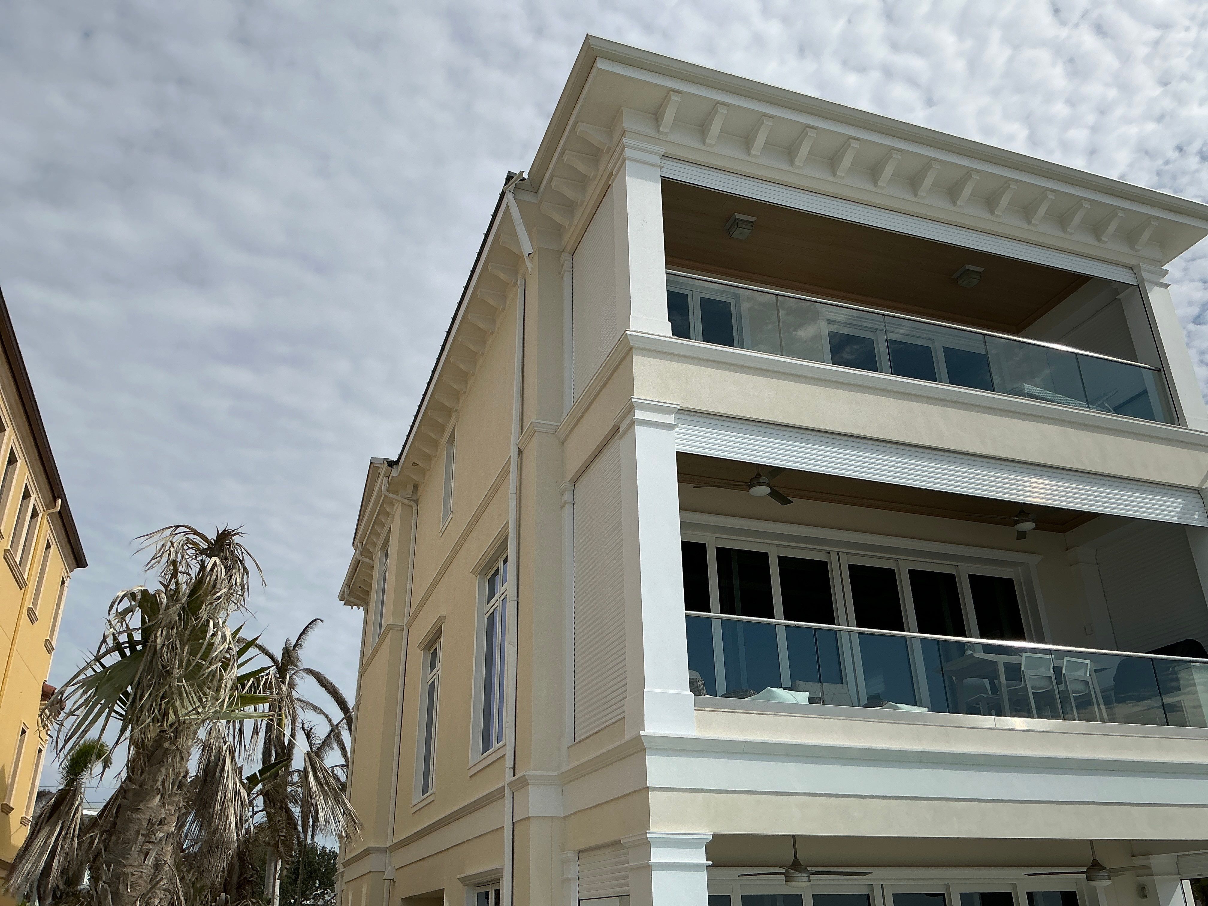 White Seamless Gutters and Downspouts in Longboat Key FL by Gutter Professors
