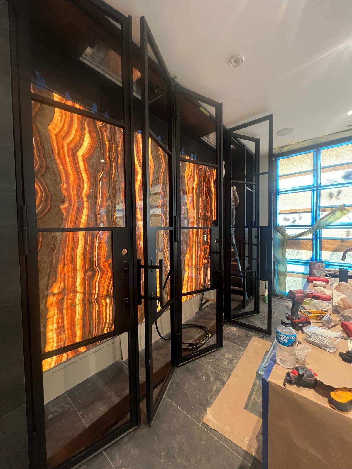 Custom Black-Framed Glass Wine Cellar Installation in Dallas by Solara Custom Living