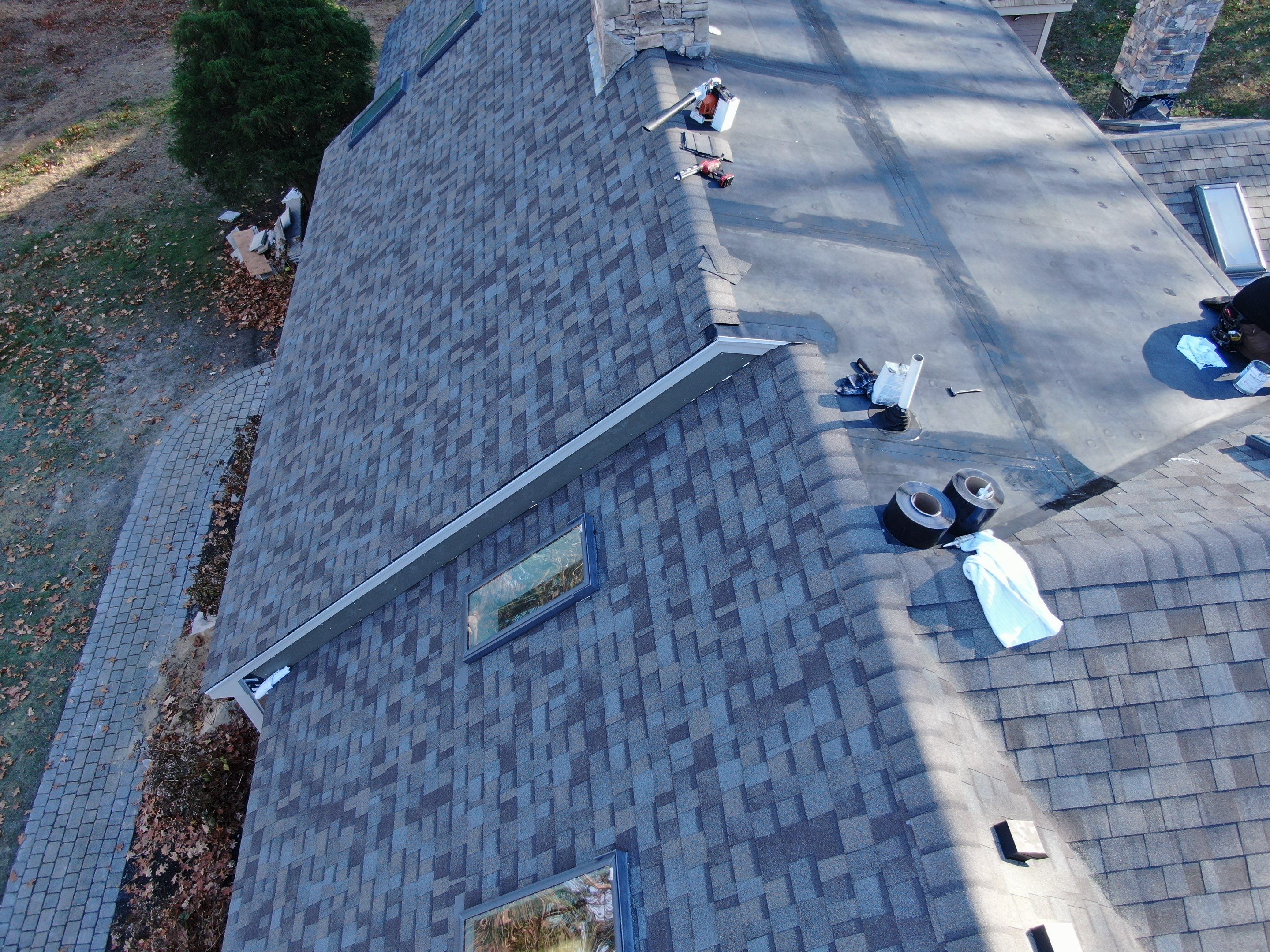 Complete House & Barn Roof with 13 Skylight Reflashing + EPDM Repairs by Mighty Dog Roofing of Greater Middlesex County