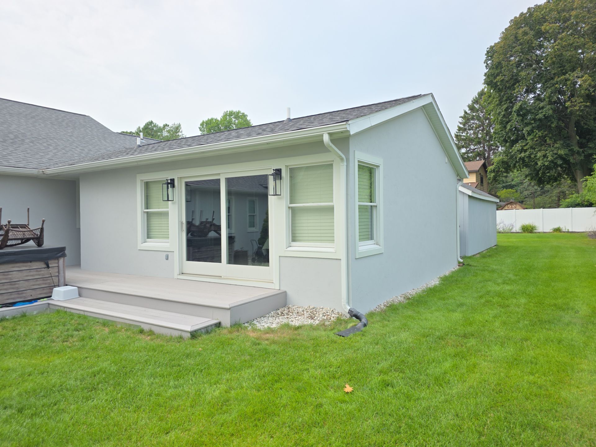 Norton Shores Residential Stucco Repair and Exterior Painting Refresh by Gordon Painting