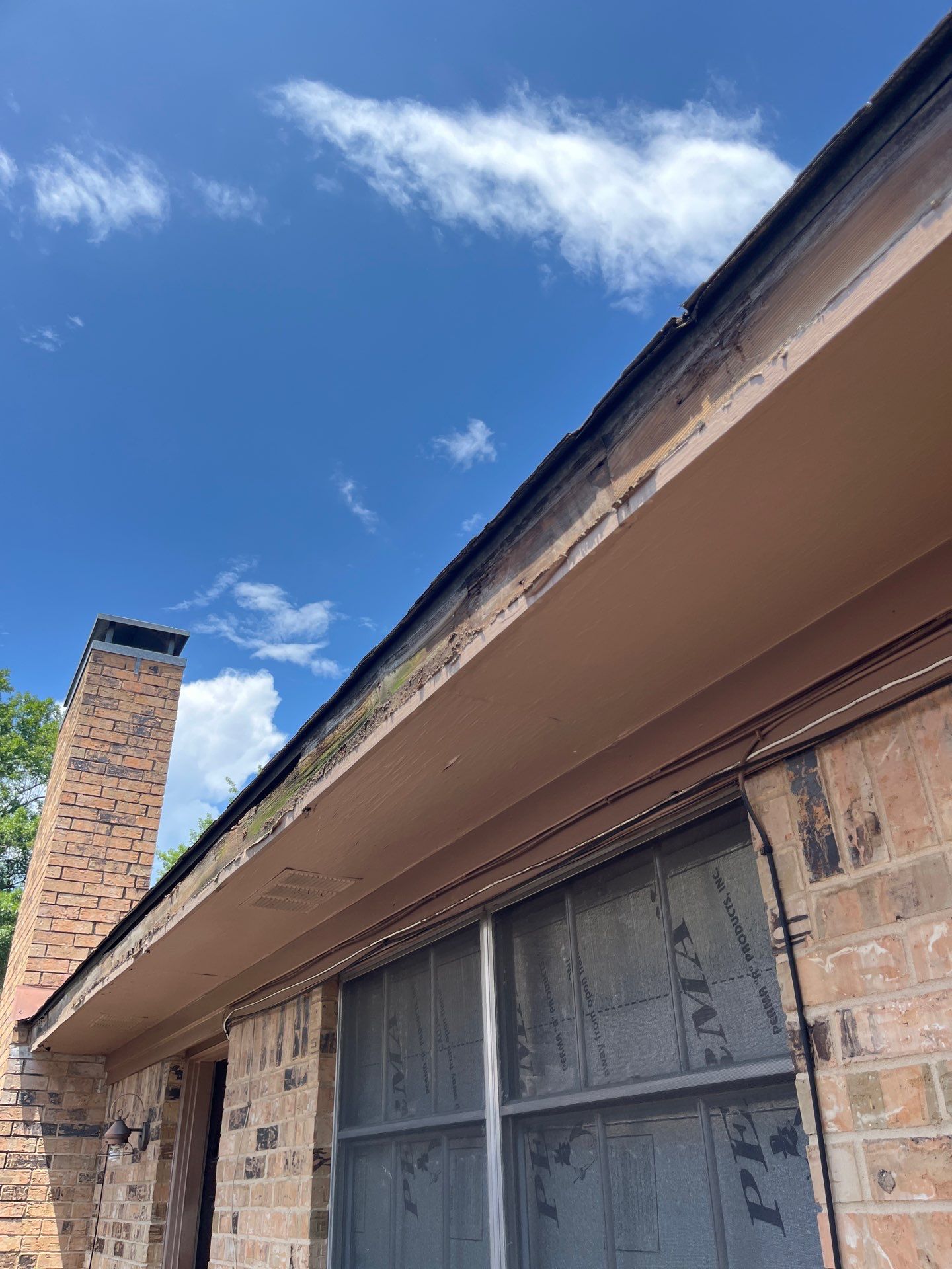Exterior Painting in Tyler, TX | Eaves, Door & Columns in Elegant Black by Quality Coats Painting