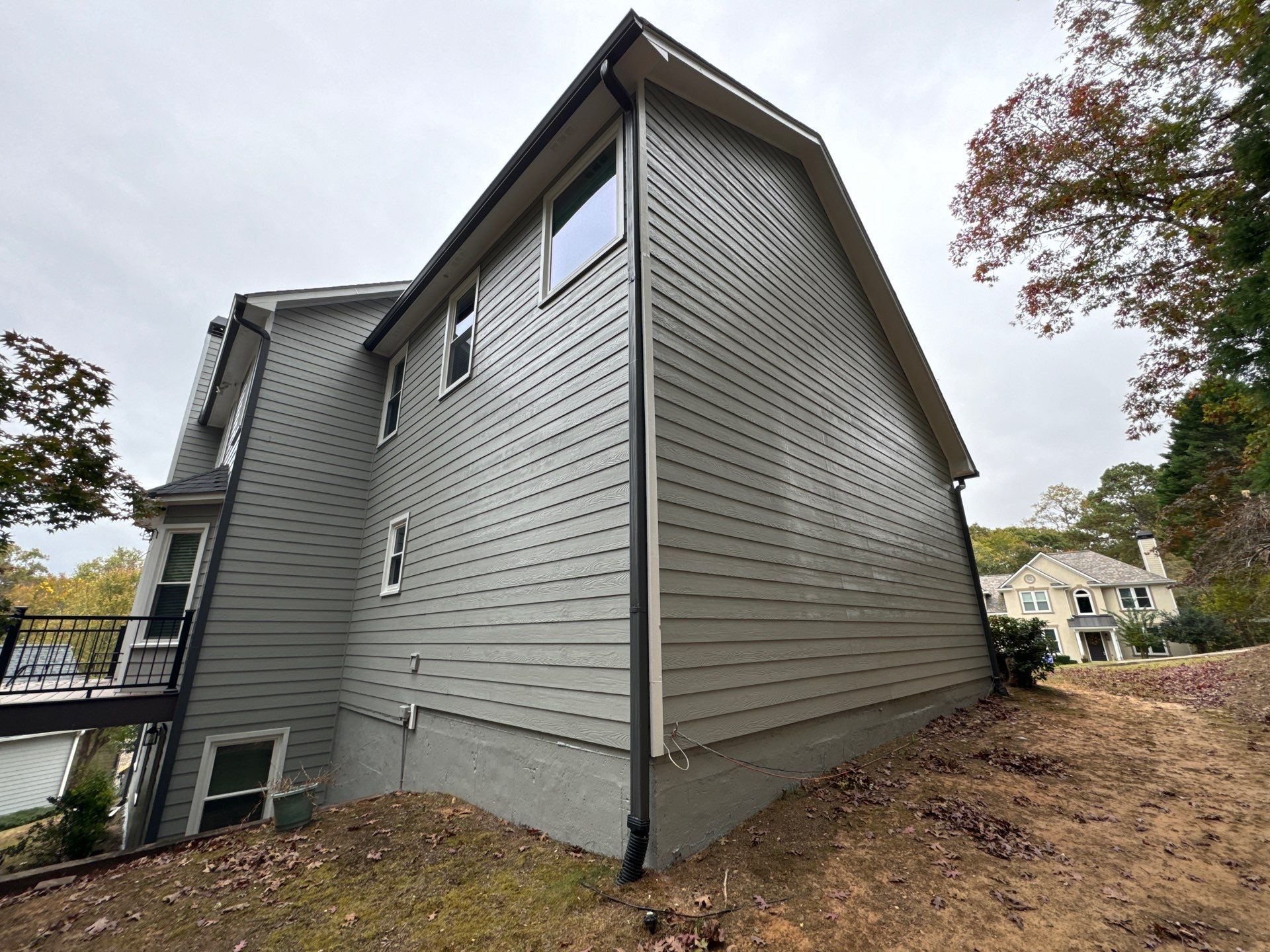 Exterior Painting and Siding Refresh for Woodstock Residential Home by Swift Home Renovations