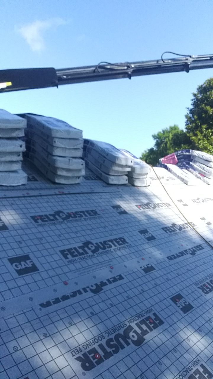 Residential Roofing Installation using Roof Replacement by American Roofing & Construction LLC
