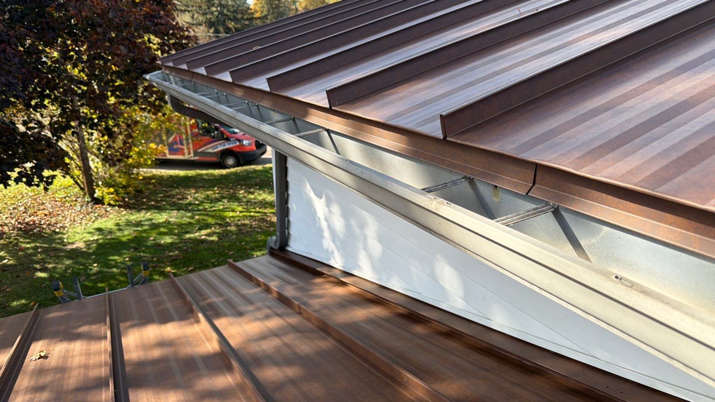 Roof Replacement using MS Standing Seam Roof Western Rust by 180 Contractors